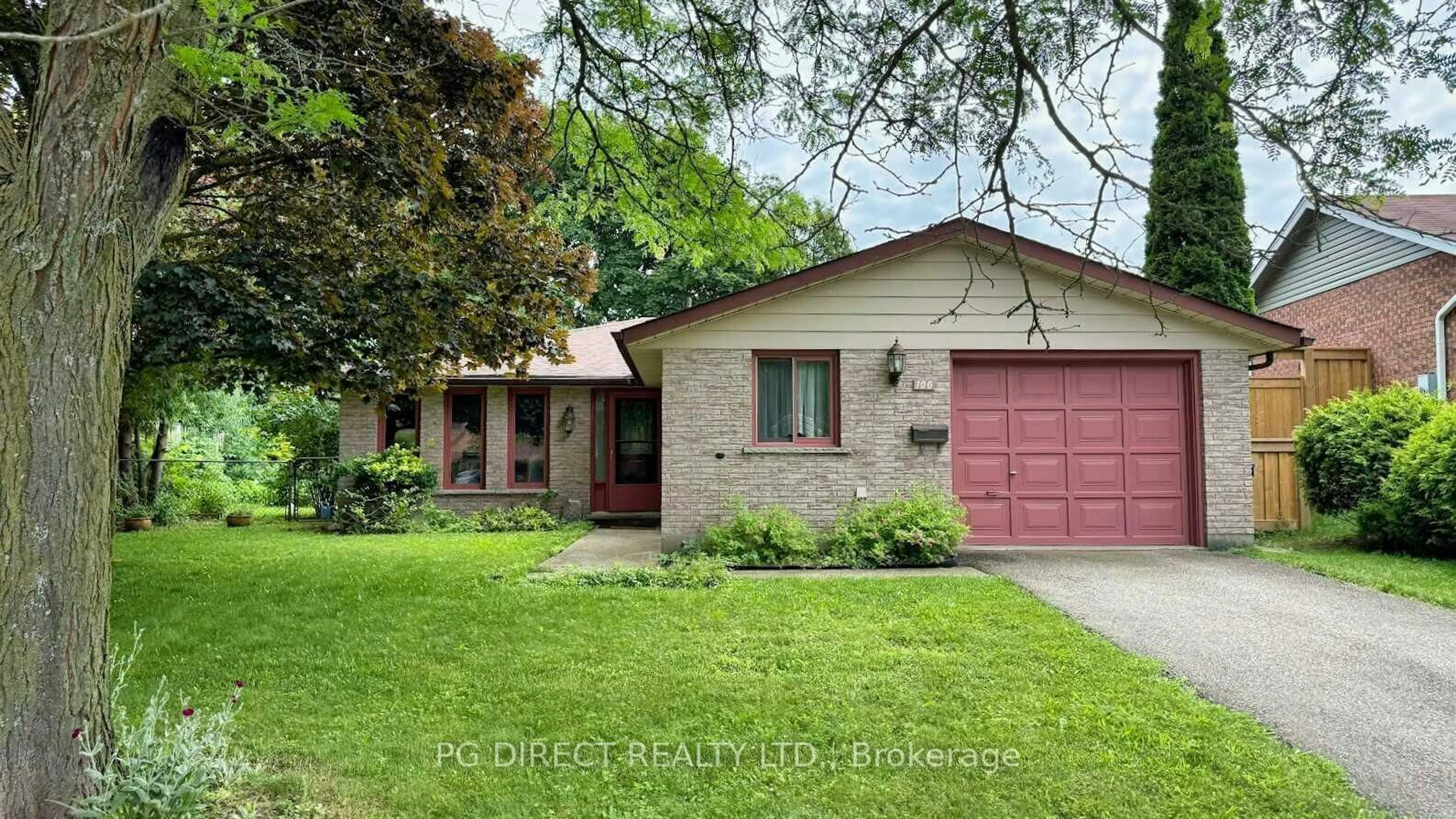 Home with brick exterior material, street for 100 Fairmeadow Dr, Guelph Ontario N1H 7T2