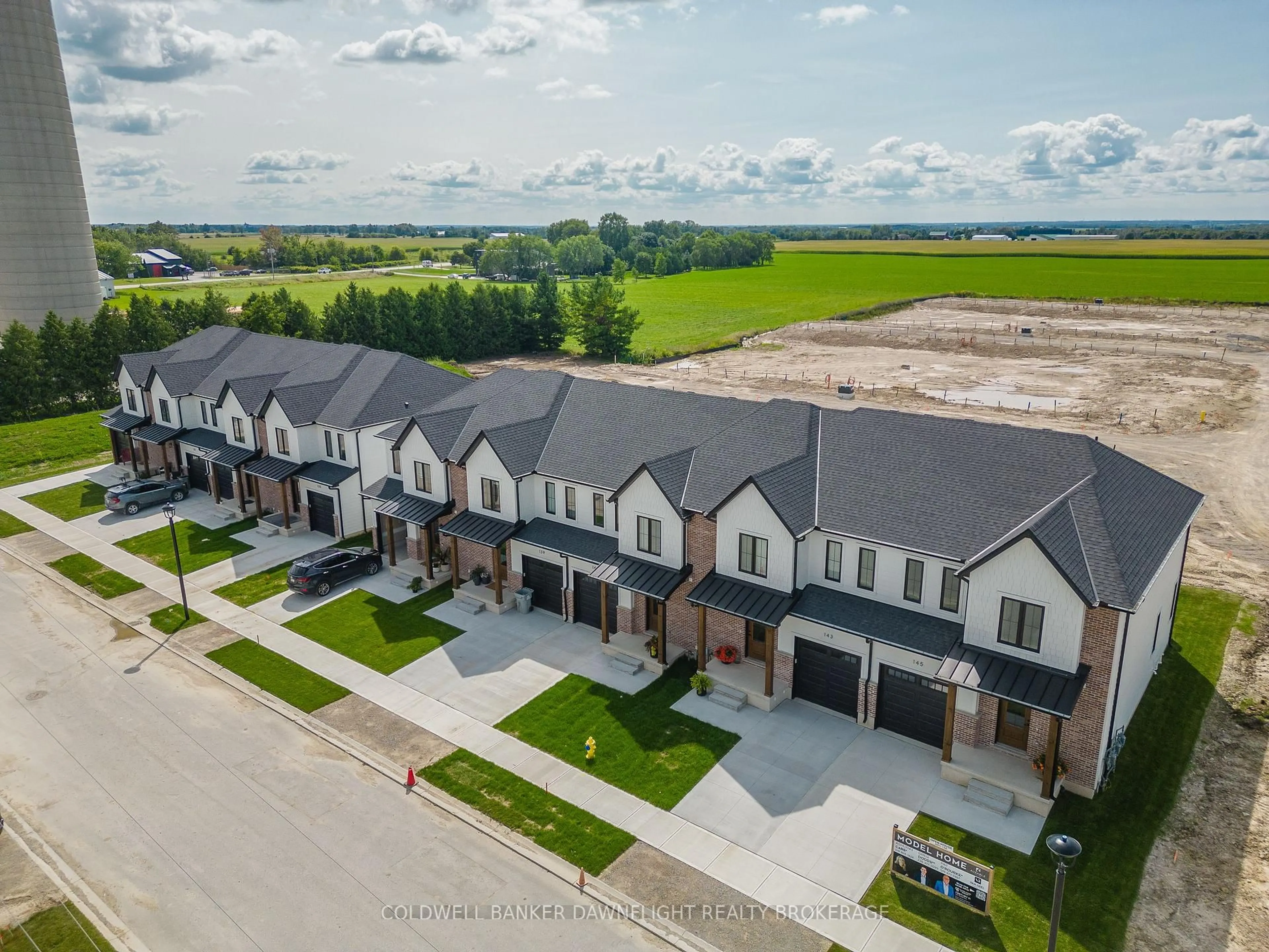 A pic from outside/outdoor area/front of a property/back of a property/a pic from drone, street for 147 Scotts Dr #11, Lucan Biddulph Ontario N0M 2J0