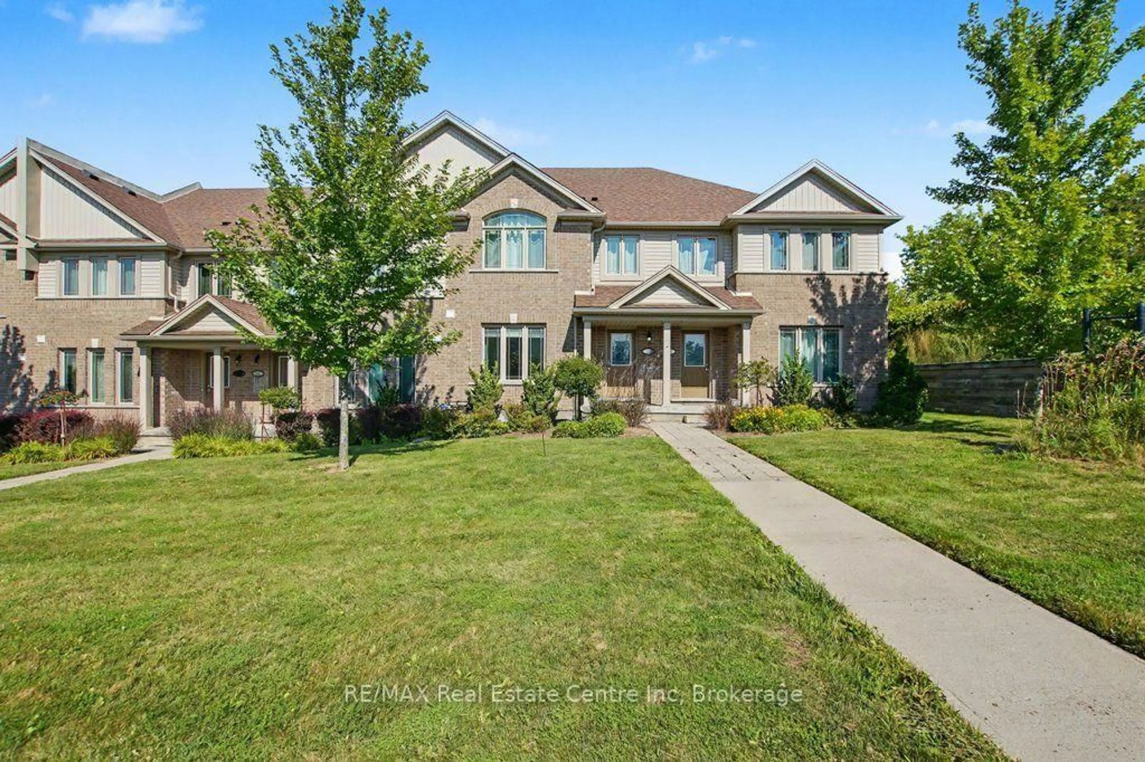 Home with brick exterior material, street for 14 Amos Dr #14, Guelph Ontario N1L 0M2