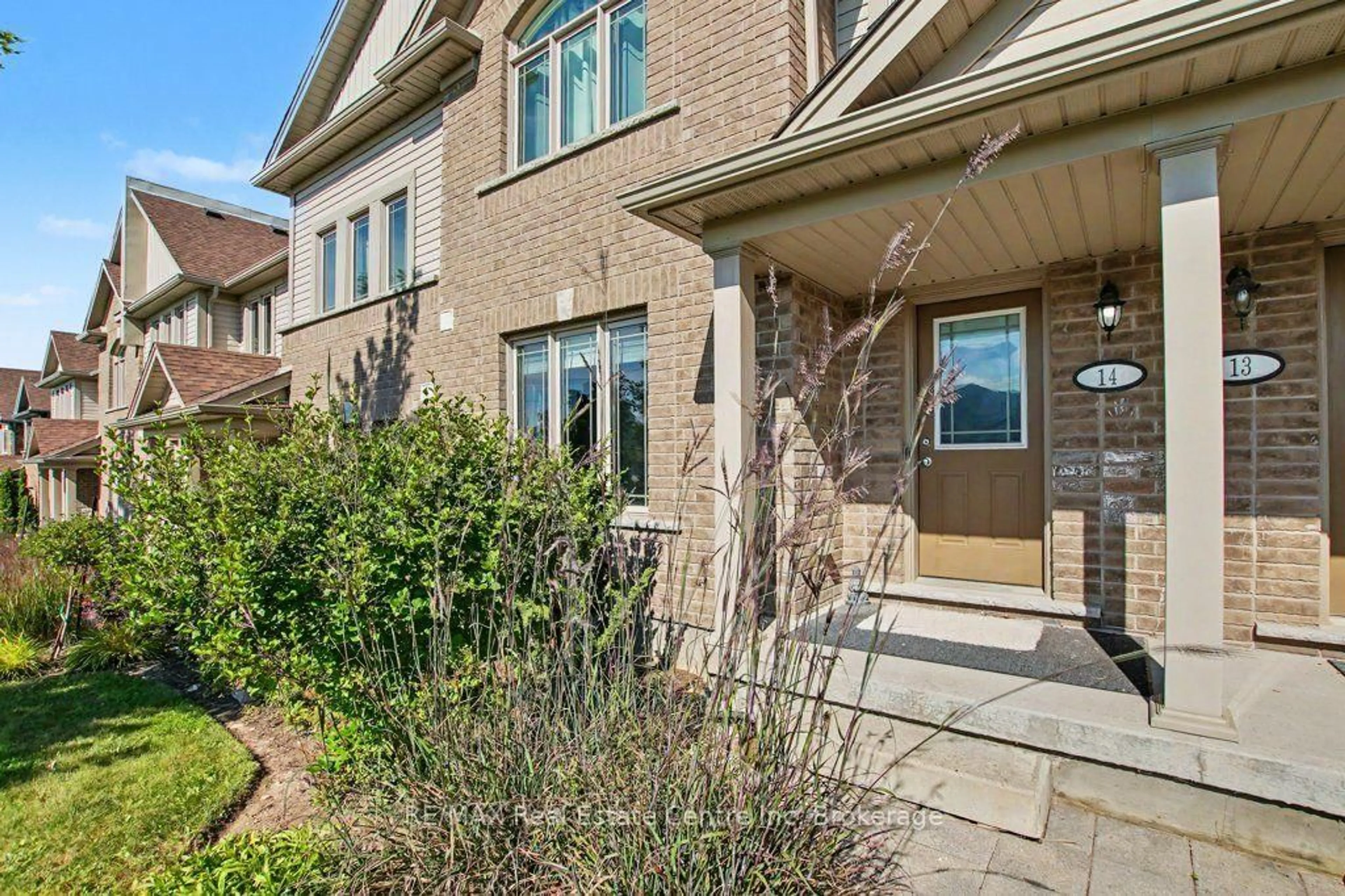 Home with brick exterior material, street for 14 Amos Dr #14, Guelph Ontario N1L 0M2