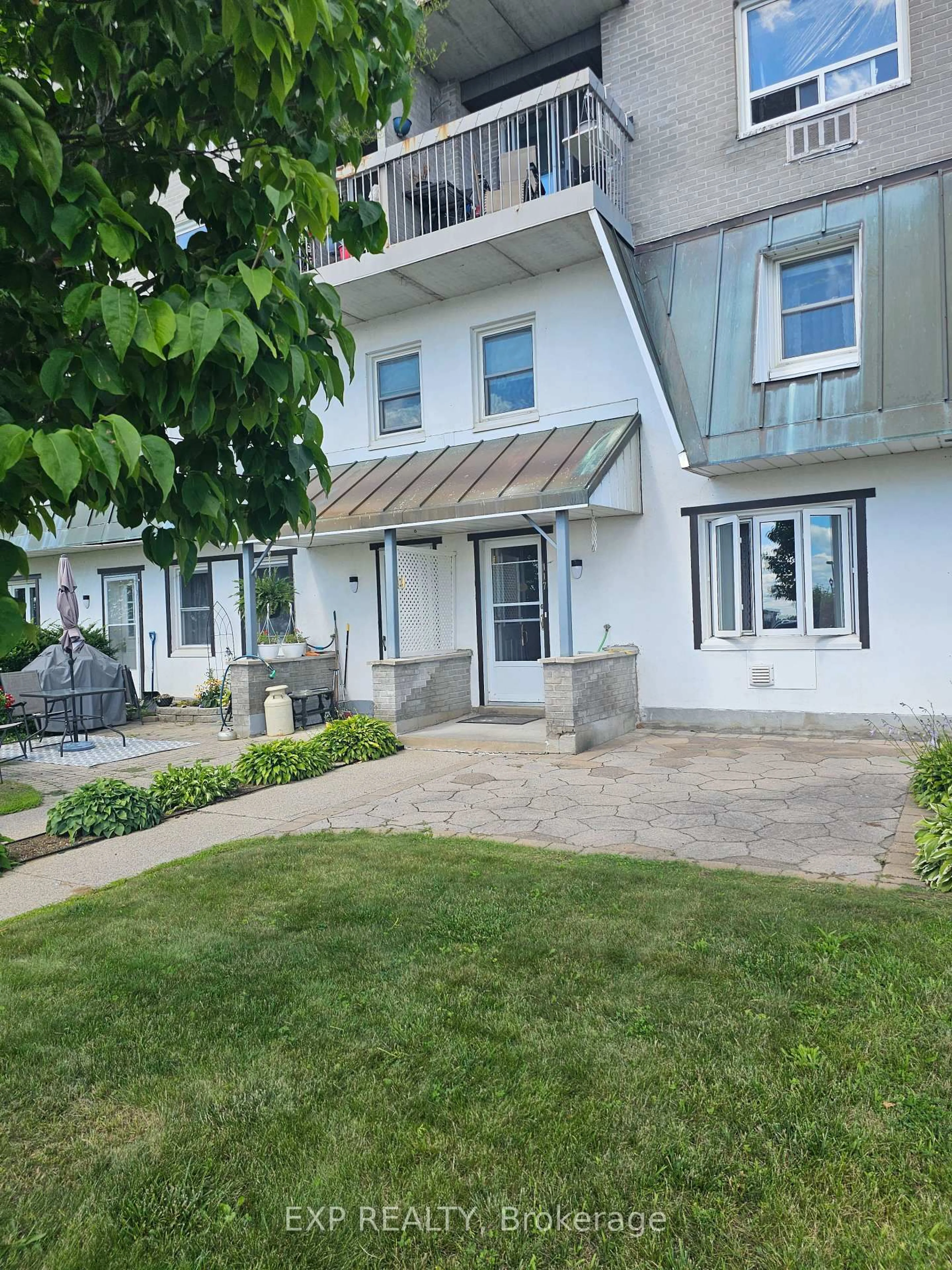 A pic from outside/outdoor area/front of a property/back of a property/a pic from drone, street for 235 Water St #117, Prescott Ontario K0E 1T0