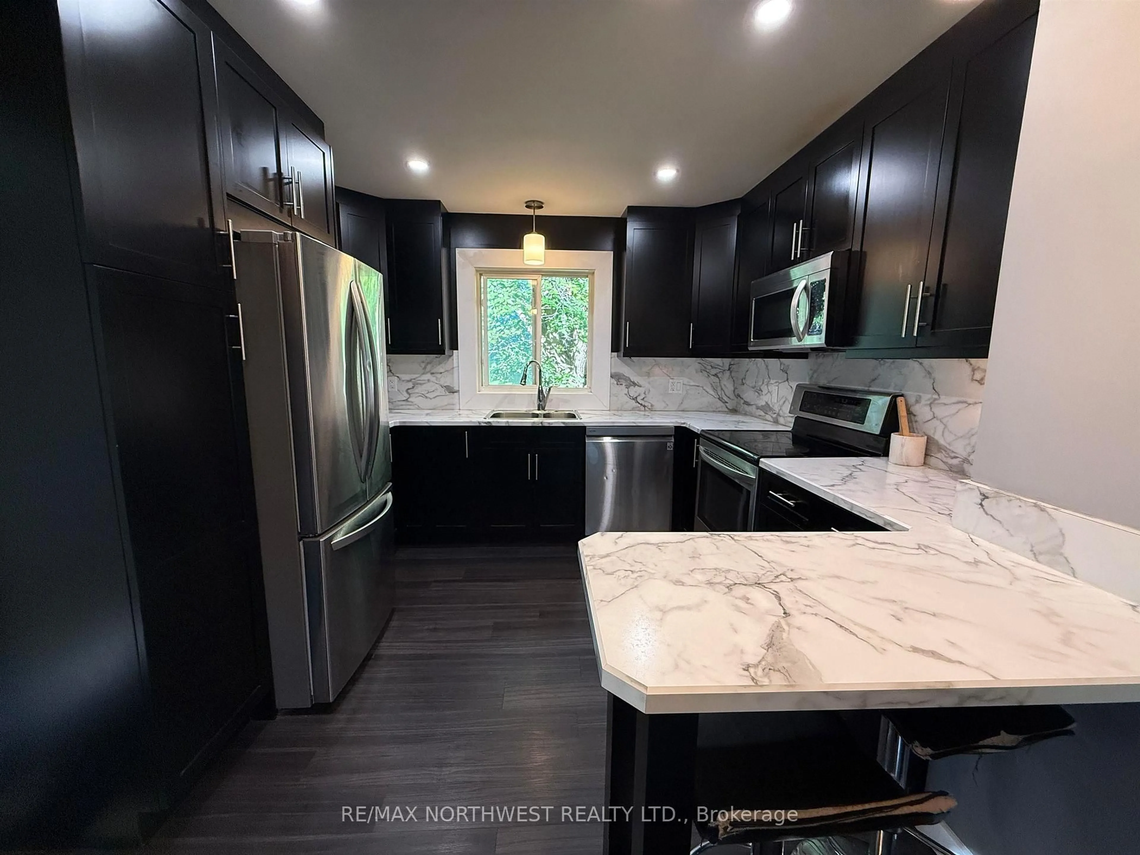 Contemporary kitchen, ceramic/tile floor for 55 Norman Drive Dr, Kenora Ontario P9N 3T5