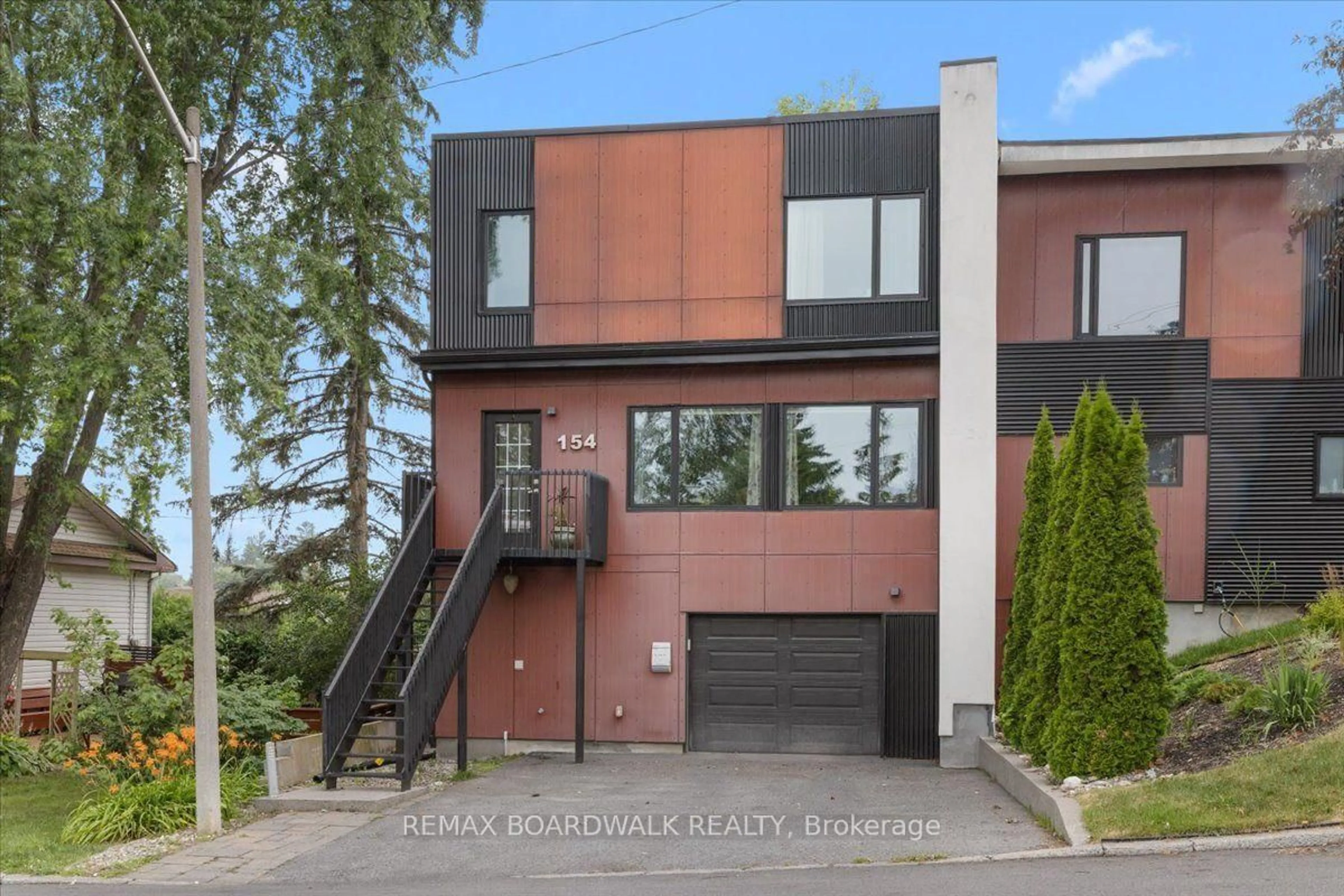 Home with brick exterior material, street for 154 Duford St, Ottawa Ontario K1L 6Z7