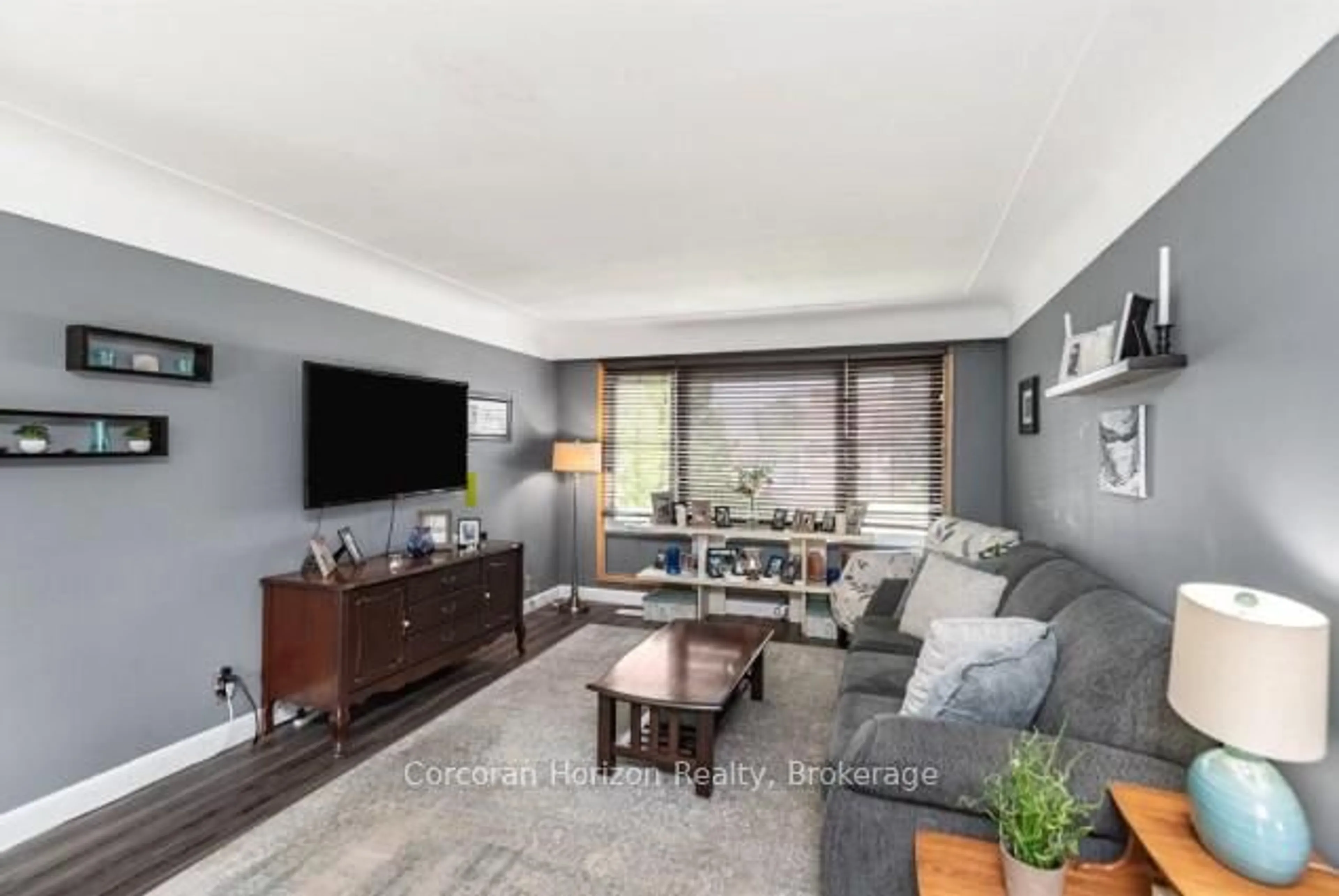 Living room with furniture, wood/laminate floor for 43 Wyngate Ave, Hamilton Ontario L8G 1T3