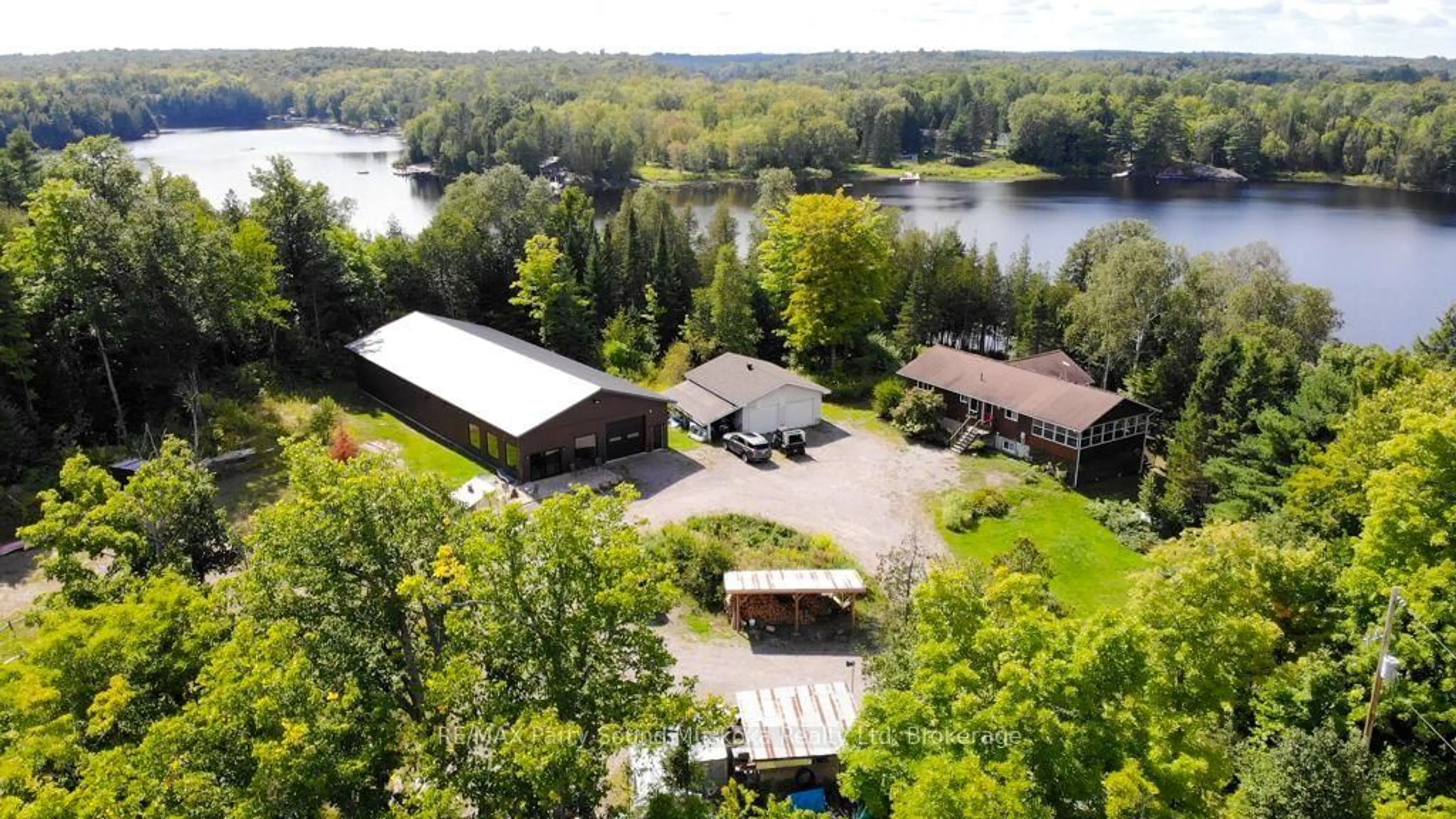 A pic from outside/outdoor area/front of a property/back of a property/a pic from drone, water/lake/river/ocean view for 77 Quinn Rd, Whitestone Ontario P0A 1G0