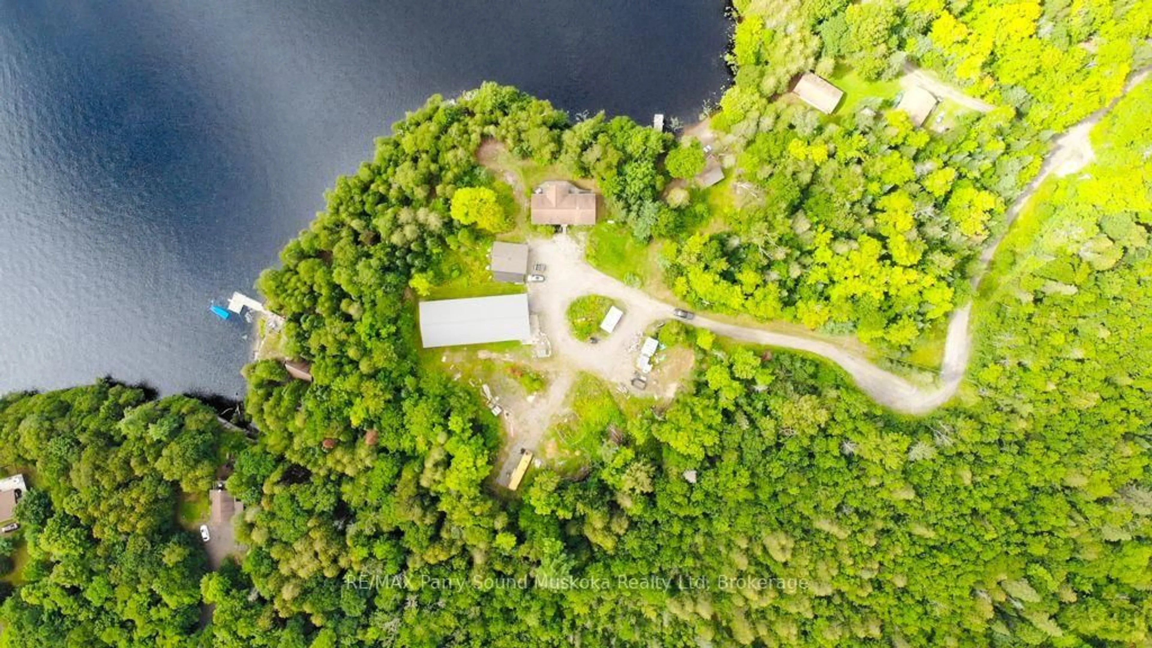A pic from outside/outdoor area/front of a property/back of a property/a pic from drone, water/lake/river/ocean view for 77 Quinn Rd, Whitestone Ontario P0A 1G0