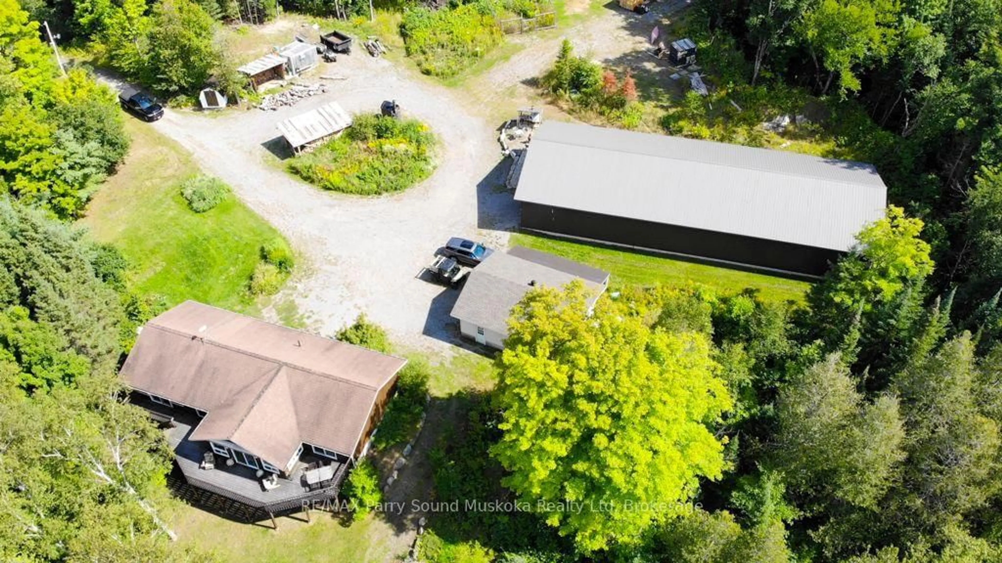 A pic from outside/outdoor area/front of a property/back of a property/a pic from drone, unknown for 77 Quinn Rd, Whitestone Ontario P0A 1G0