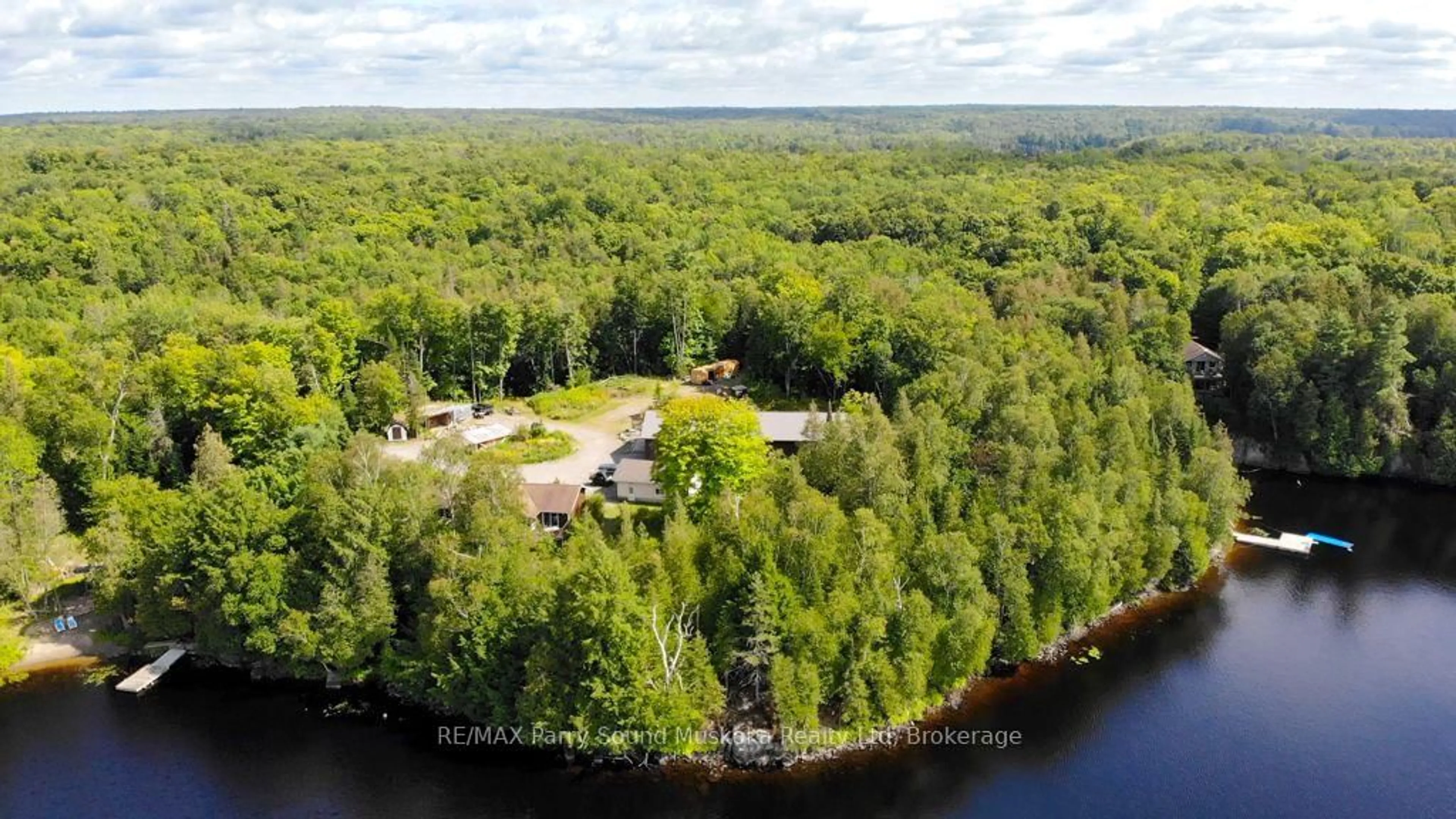 A pic from outside/outdoor area/front of a property/back of a property/a pic from drone, water/lake/river/ocean view for 77 Quinn Rd, Whitestone Ontario P0A 1G0