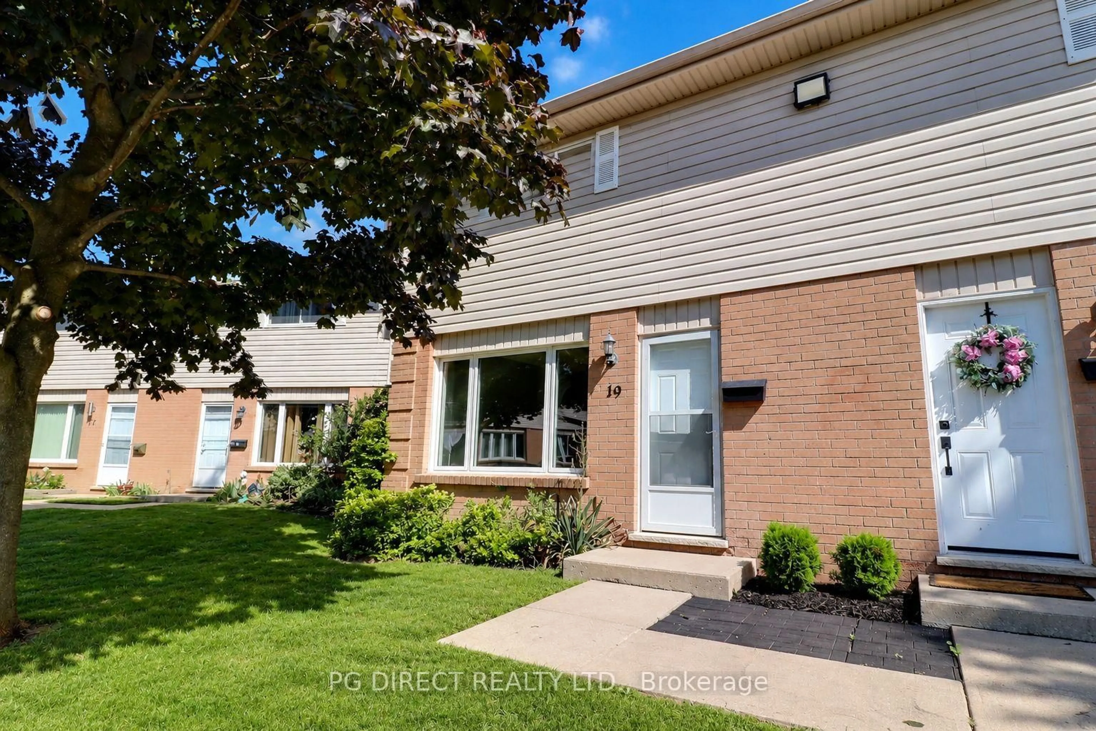 Home with brick exterior material, street for 75 Gatewood Pl #19, London East Ontario N5Y 5A4