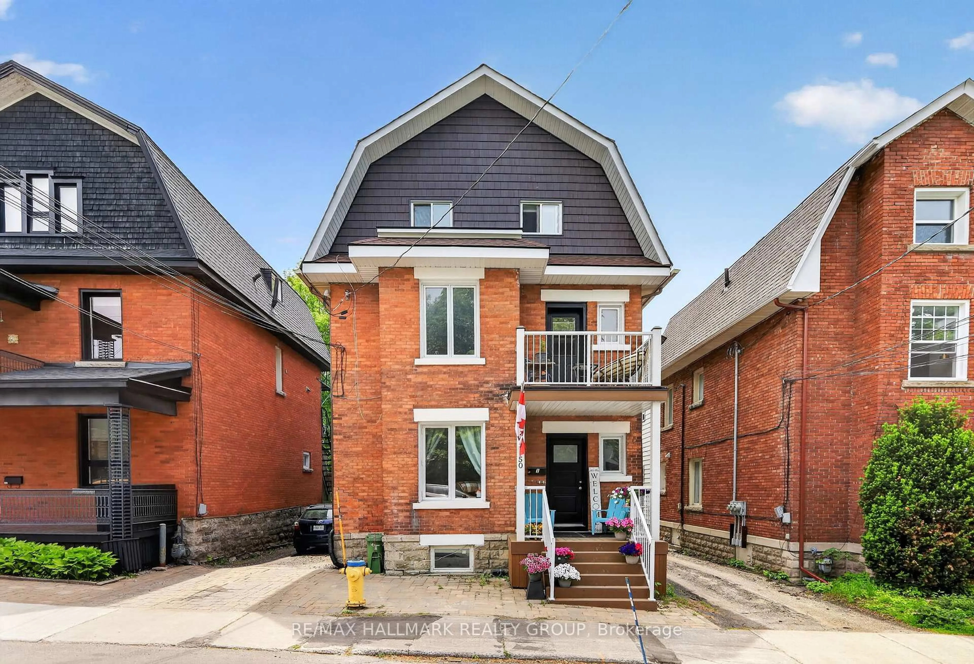 Home with brick exterior material, street for 50 Aylmer Ave, Ottawa Ontario K1S 2X1