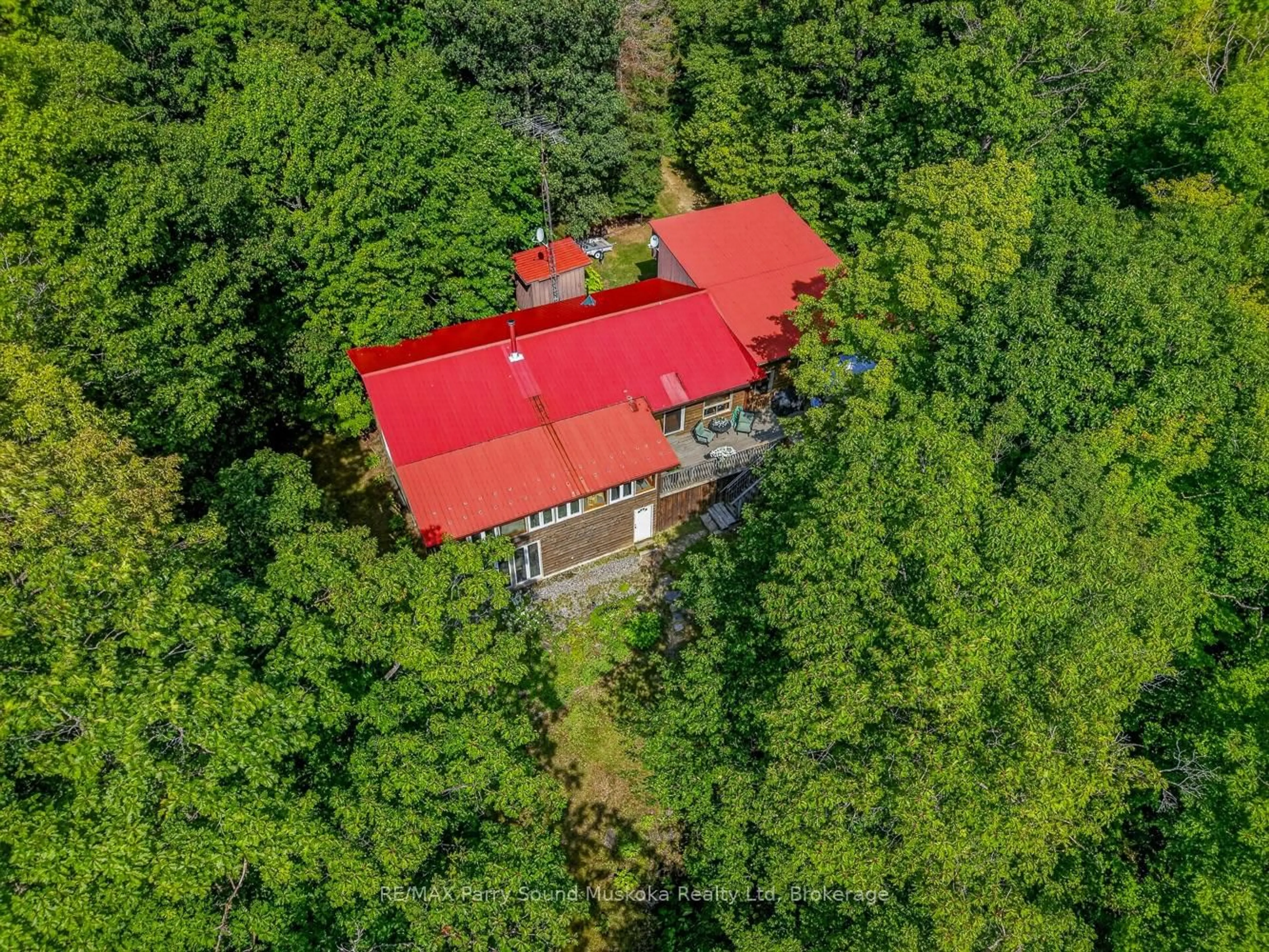 A pic from outside/outdoor area/front of a property/back of a property/a pic from drone, forest/trees view for 53 Crown Retreats Rd, Whitestone Ontario P0A 1G0