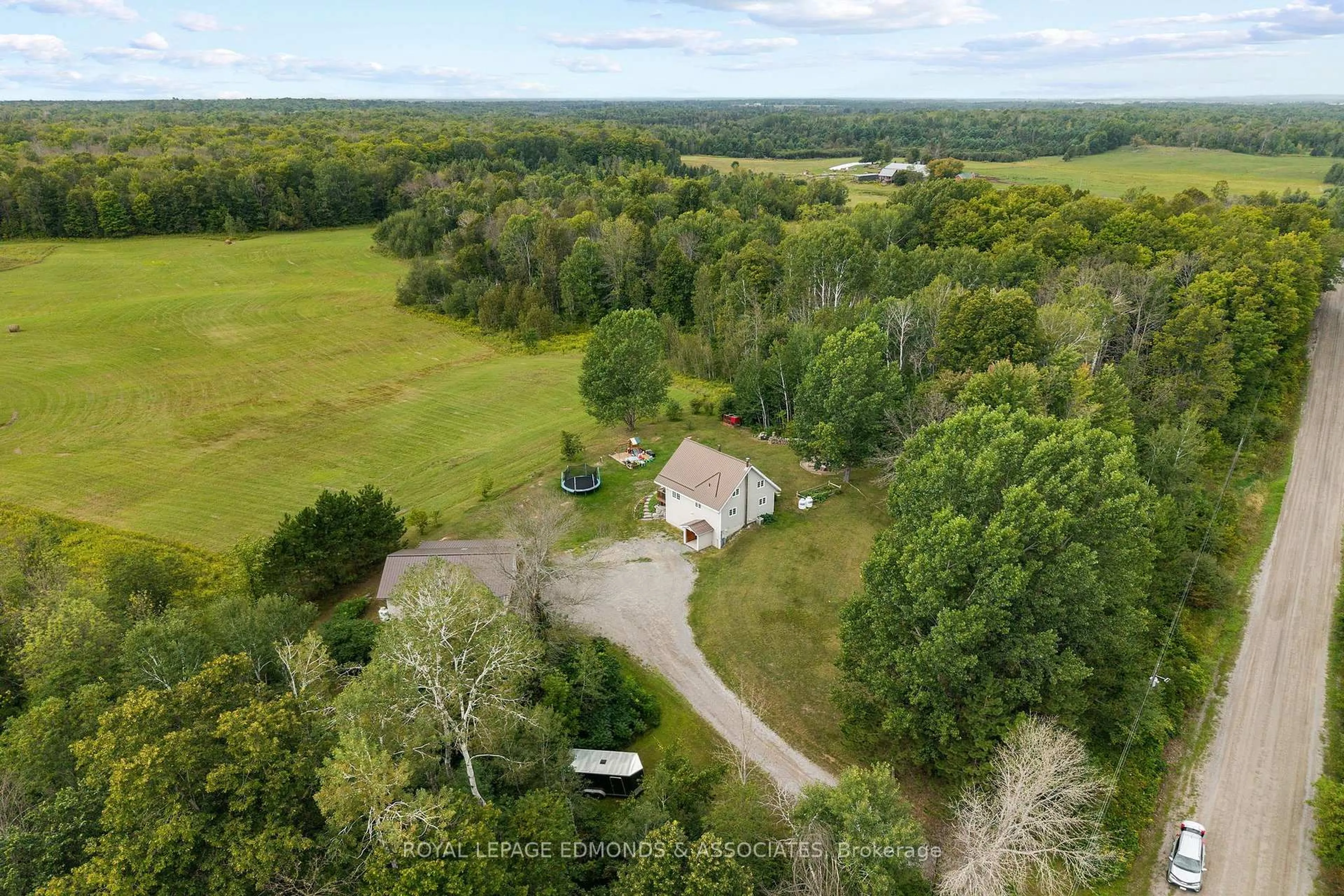 A pic from outside/outdoor area/front of a property/back of a property/a pic from drone, forest/trees view for 135 Behm Line, Cobden Ontario K0J 1K0