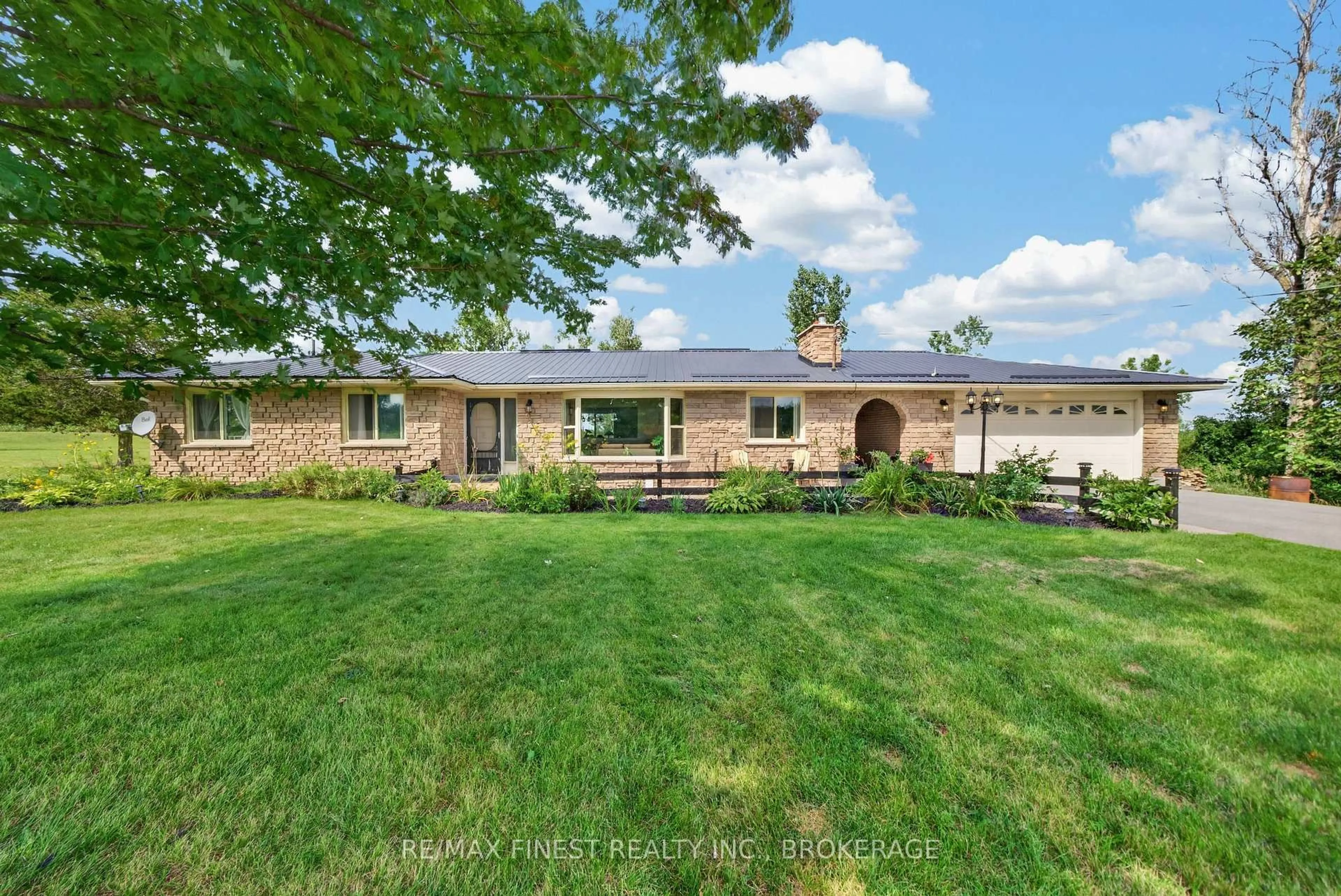 A pic from outside/outdoor area/front of a property/back of a property/a pic from drone, street for 513 County Road 12, Greater Napanee Ontario K0K 2W0