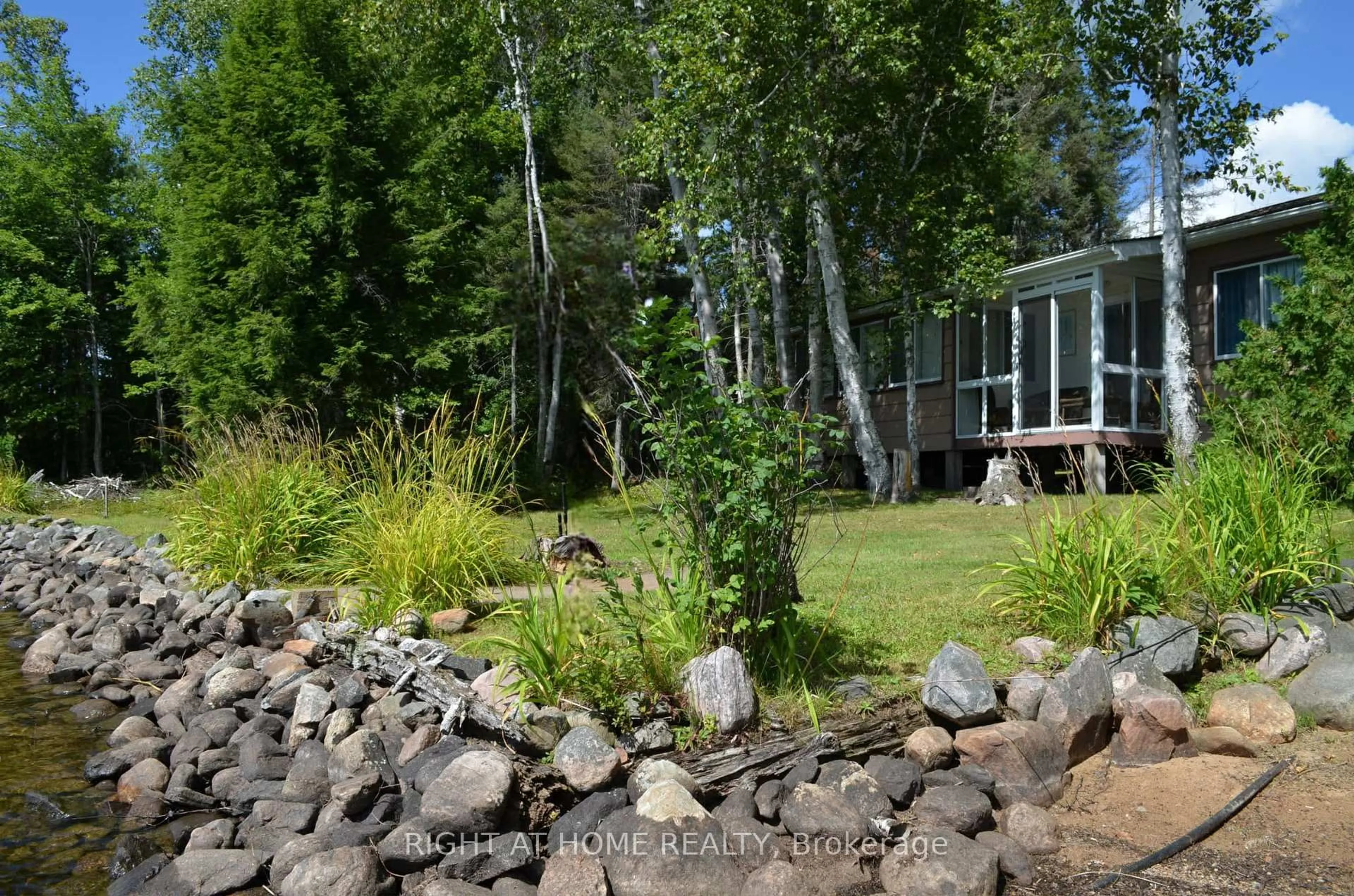 Patio, forest/trees view for 37 Willards Lane, Parry Sound Remote Area Ontario P0A 1X0