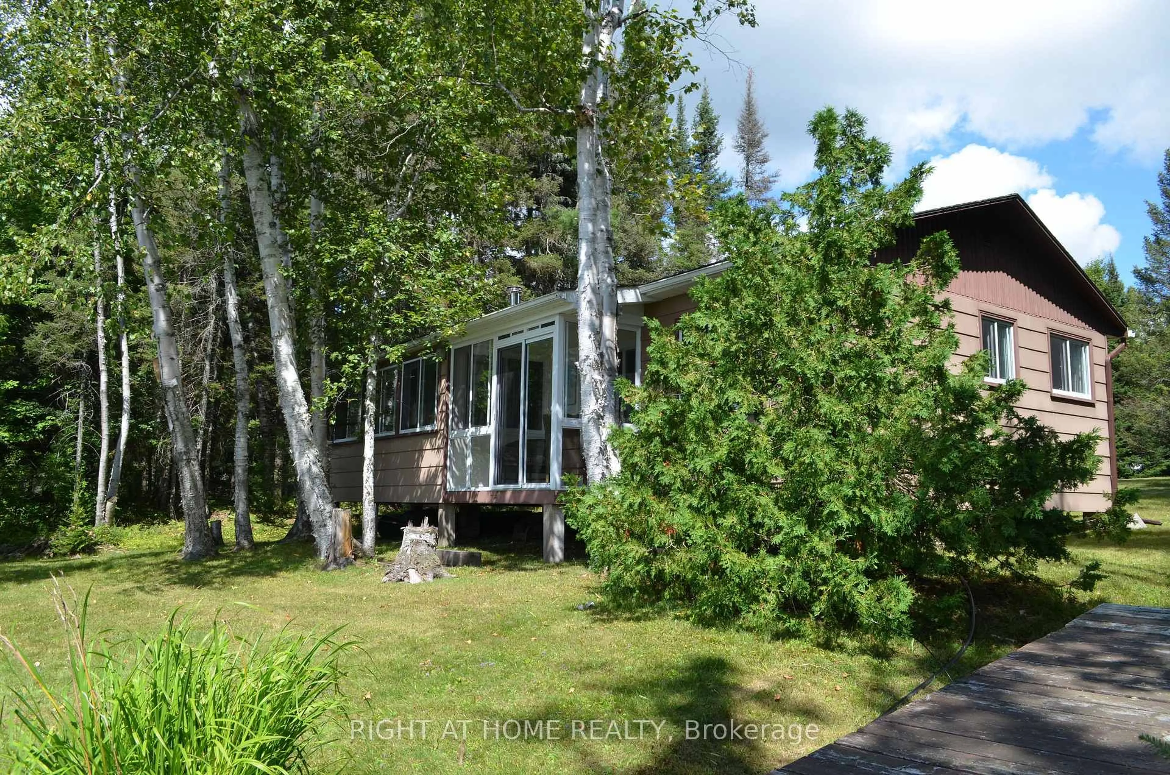 A pic from outside/outdoor area/front of a property/back of a property/a pic from drone, forest/trees view for 37 Willards Lane, Parry Sound Remote Area Ontario P0A 1X0