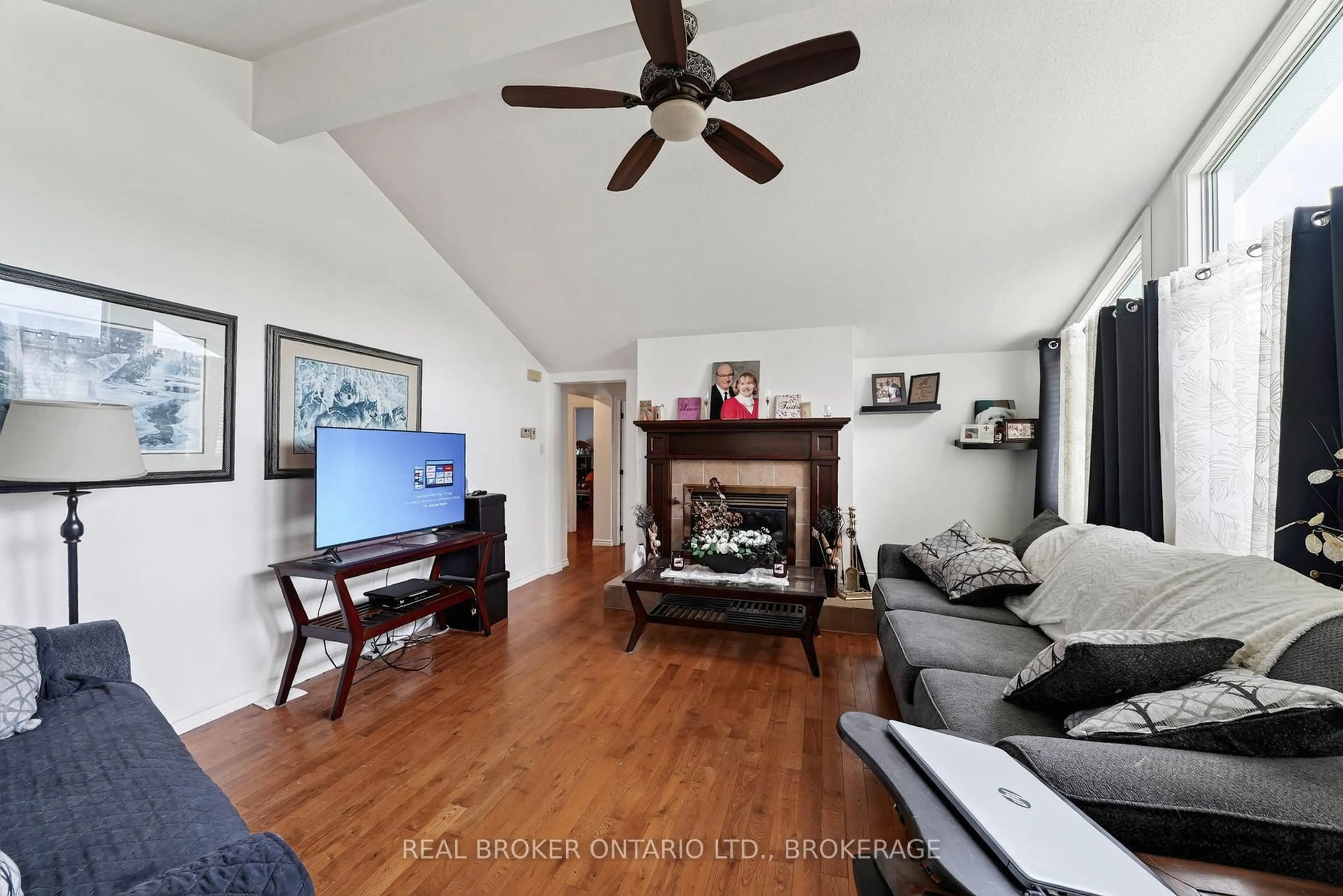 Living room with furniture, wood/laminate floor for 14950 Sandtown Rd, South Stormont Ontario K0C 1Y0