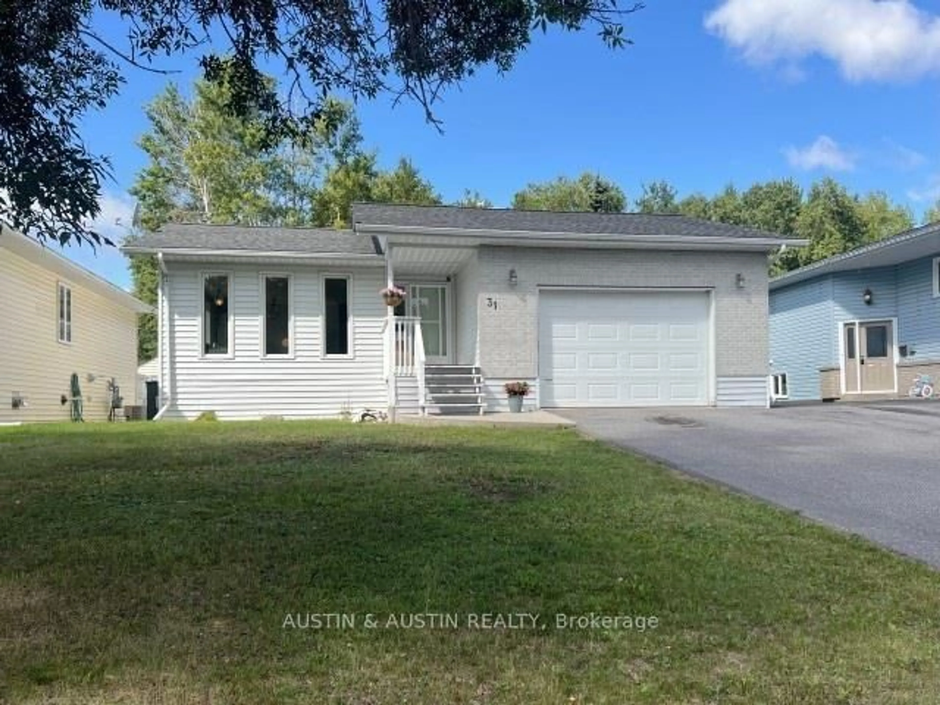 Home with vinyl exterior material, street for 31 Mario Milanese Pl, Dryden Ontario P8N 3G8