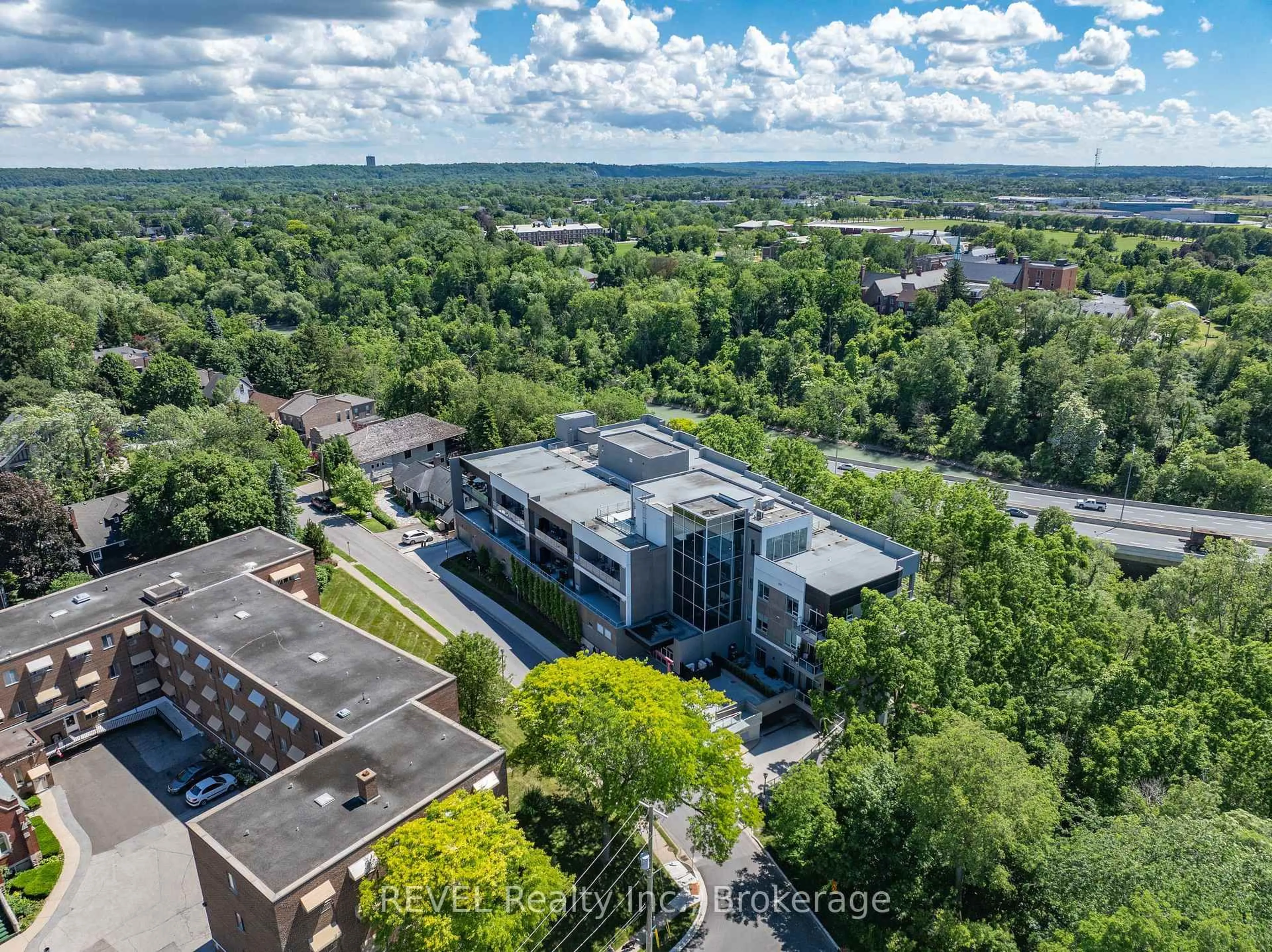A pic from outside/outdoor area/front of a property/back of a property/a pic from drone, city buildings view from balcony for 77 Yates St #606, St. Catharines Ontario L2R 5R7
