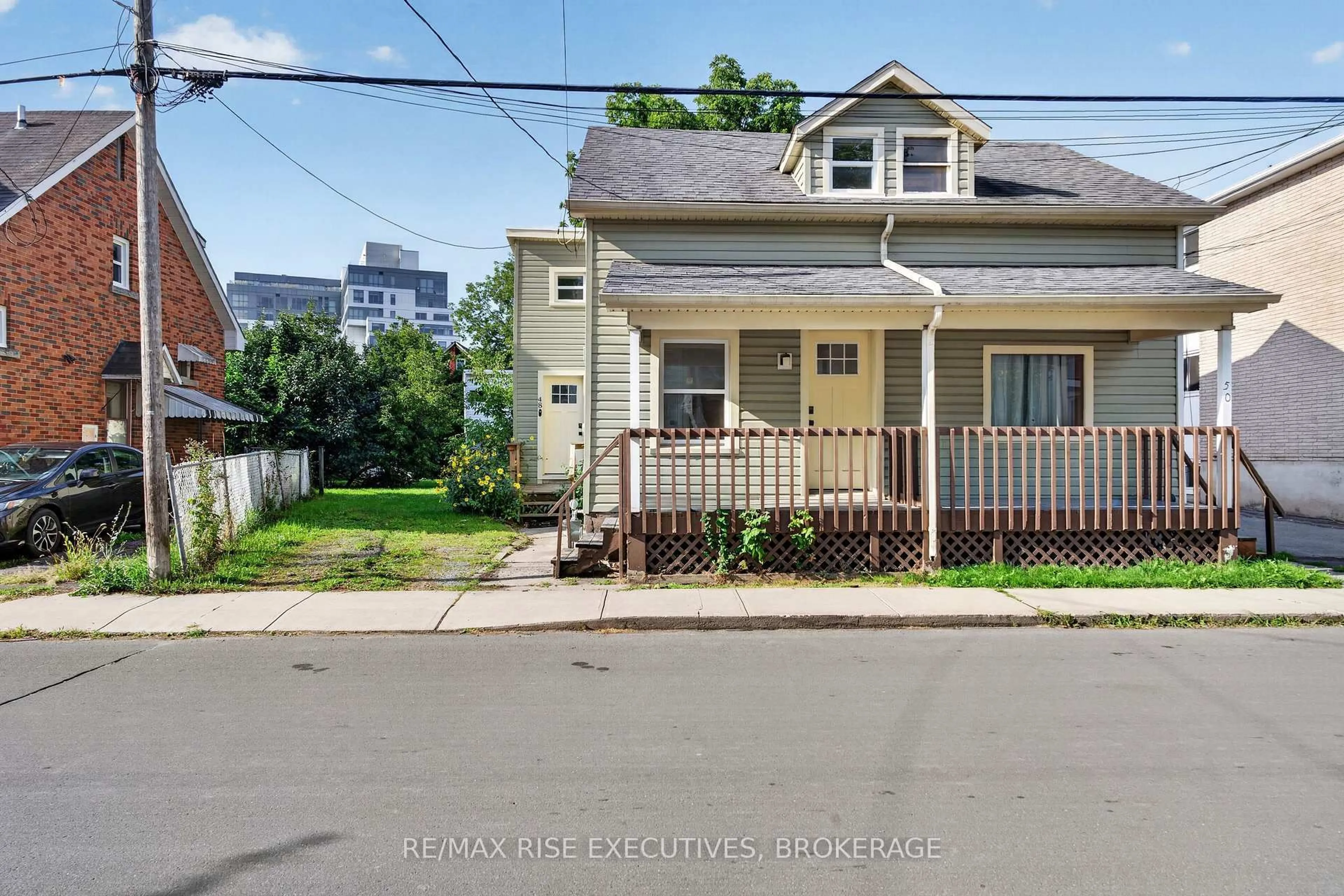 A pic from outside/outdoor area/front of a property/back of a property/a pic from drone, street for 48 Elm St, Kingston Ontario K7K 1M9