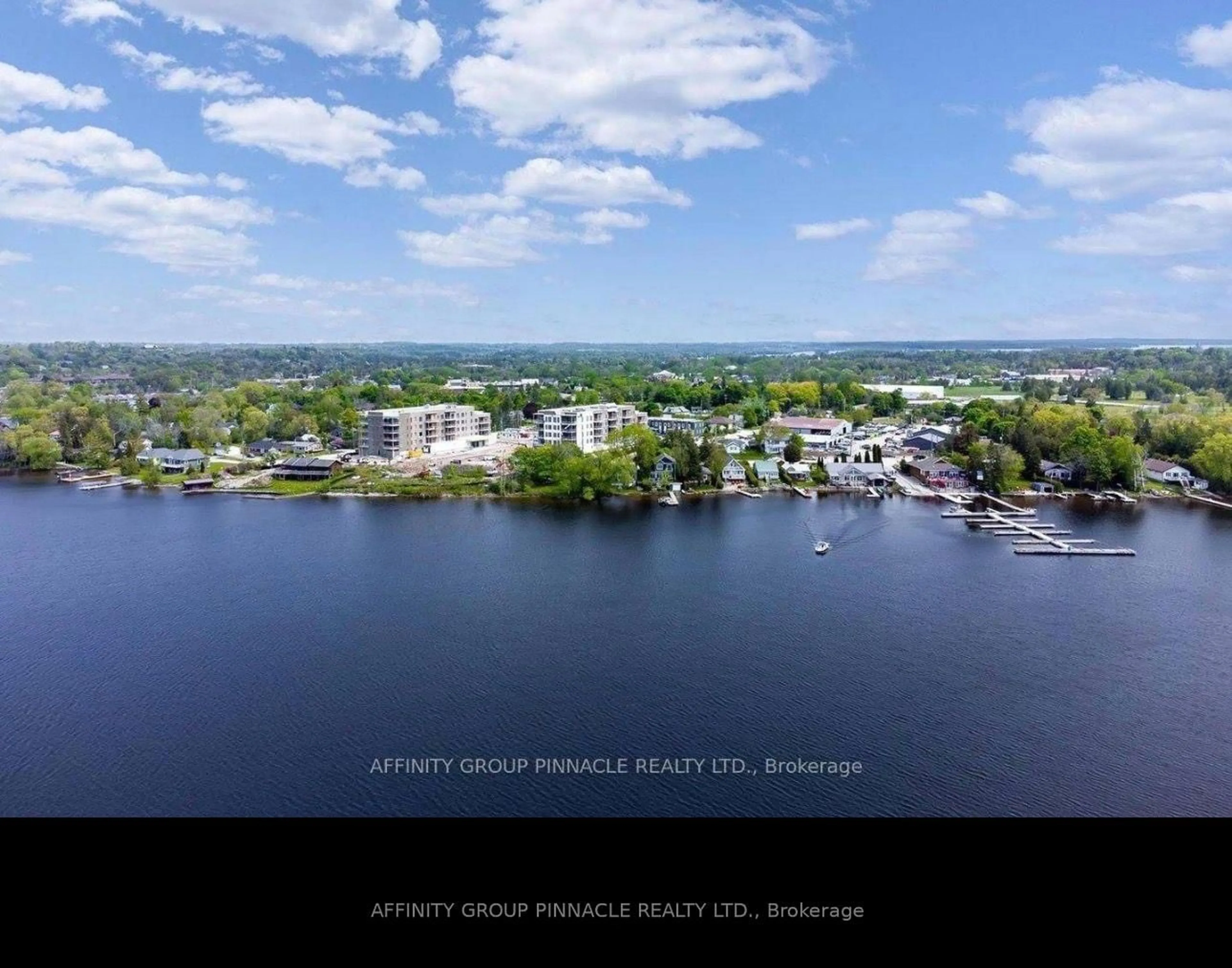 A pic from outside/outdoor area/front of a property/back of a property/a pic from drone, water/lake/river/ocean view for 19 A West St #302, Kawartha Lakes Ontario K0M 1N0