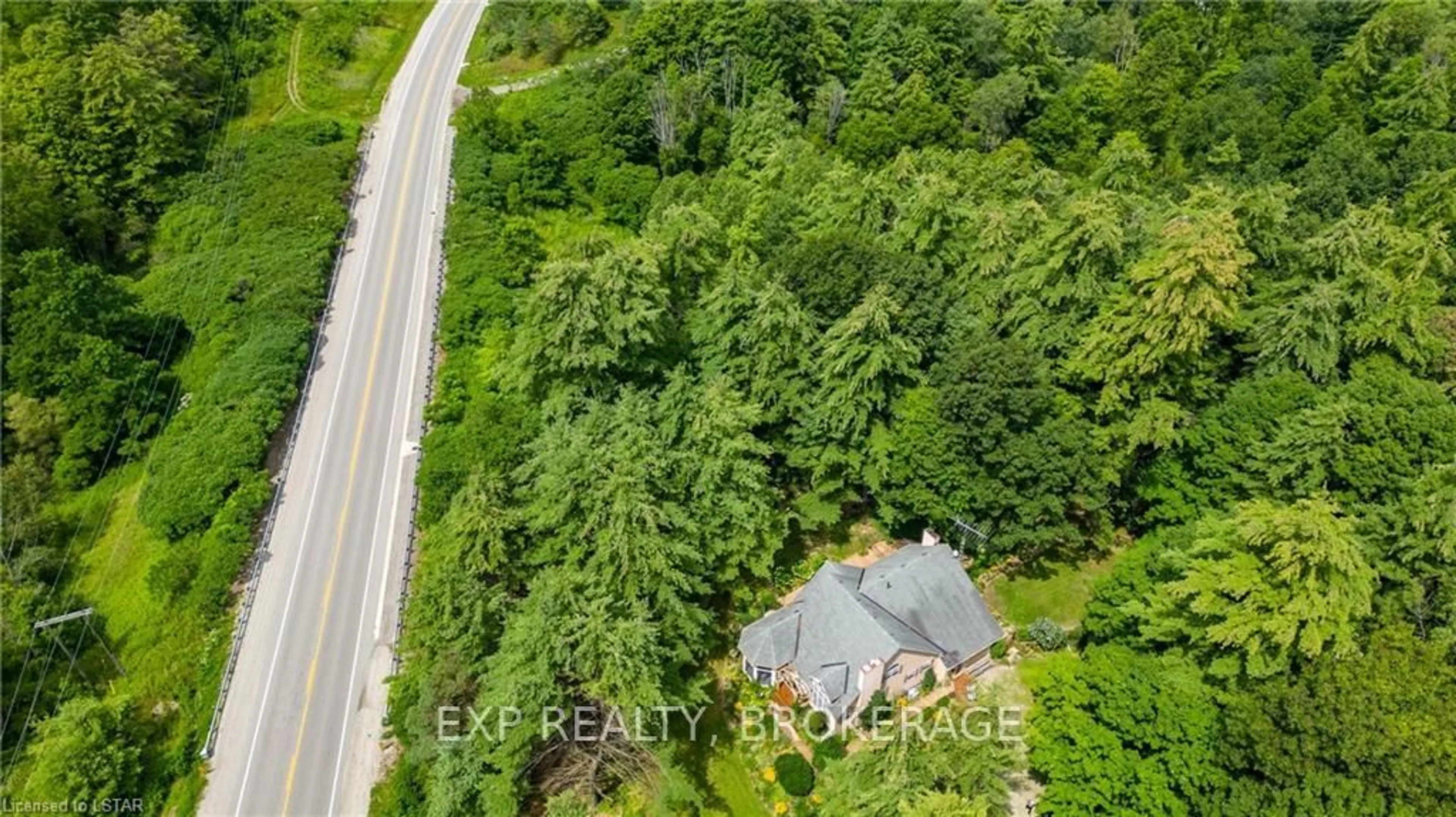 A pic from outside/outdoor area/front of a property/back of a property/a pic from drone, forest/trees view for 55516 Heritage Line, Bayham Ontario N0J 1Y0
