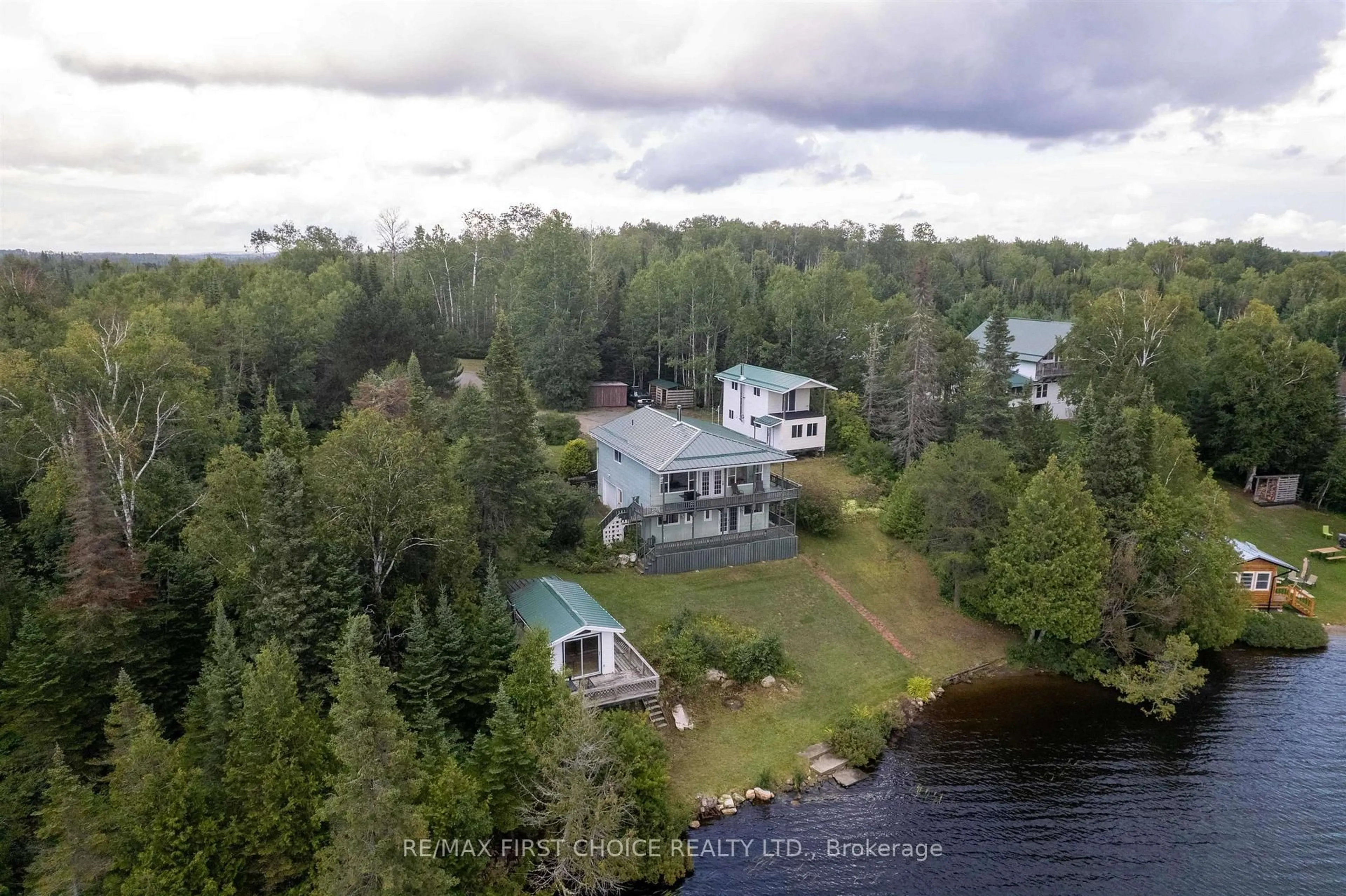 A pic from outside/outdoor area/front of a property/back of a property/a pic from drone, water/lake/river/ocean view for 32I One Island Lake Rd, Thunder Bay Remote Area Ontario P7G 0W4