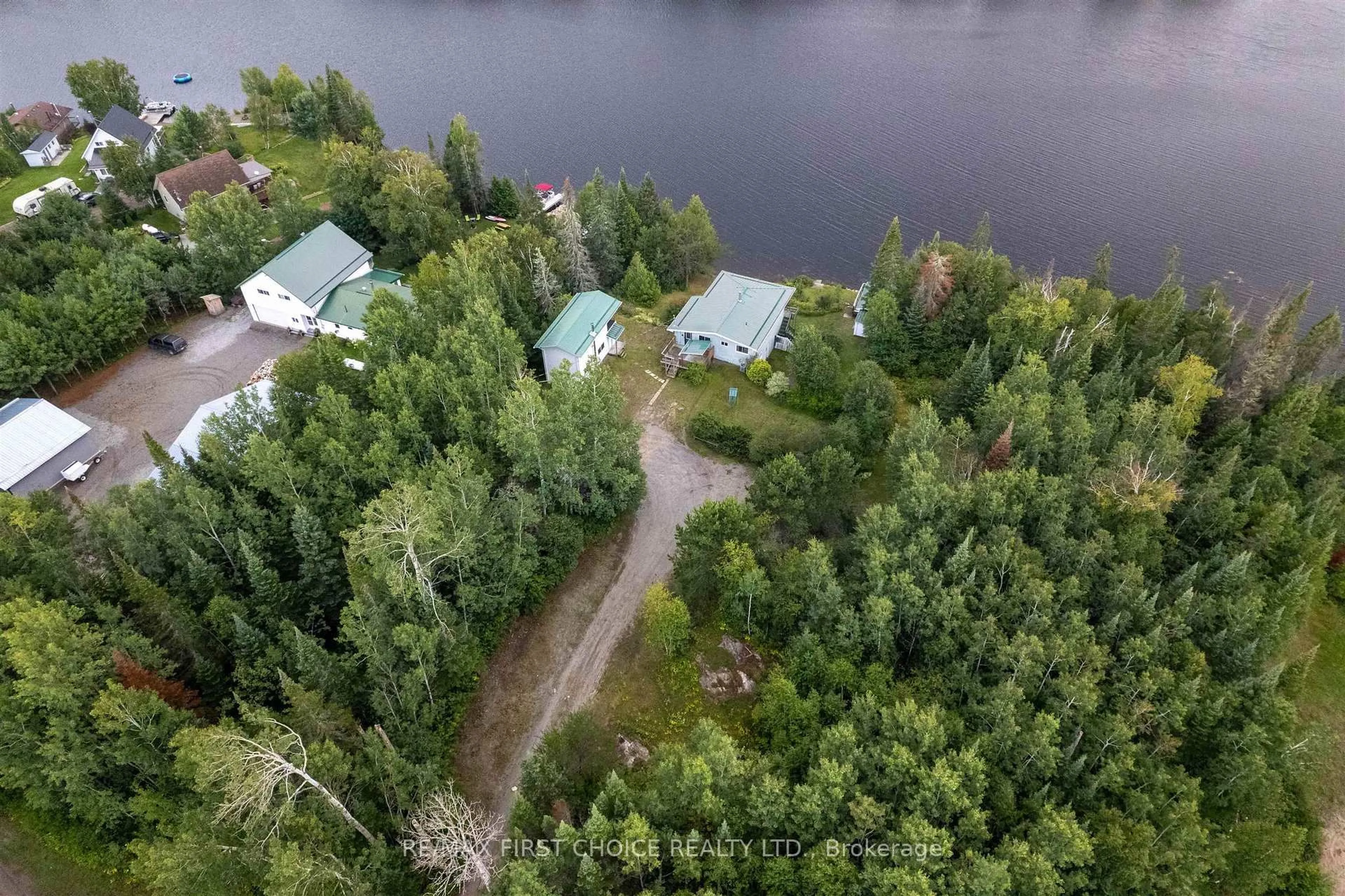A pic from outside/outdoor area/front of a property/back of a property/a pic from drone, water/lake/river/ocean view for 32I One Island Lake Rd, Thunder Bay Remote Area Ontario P7G 0W4