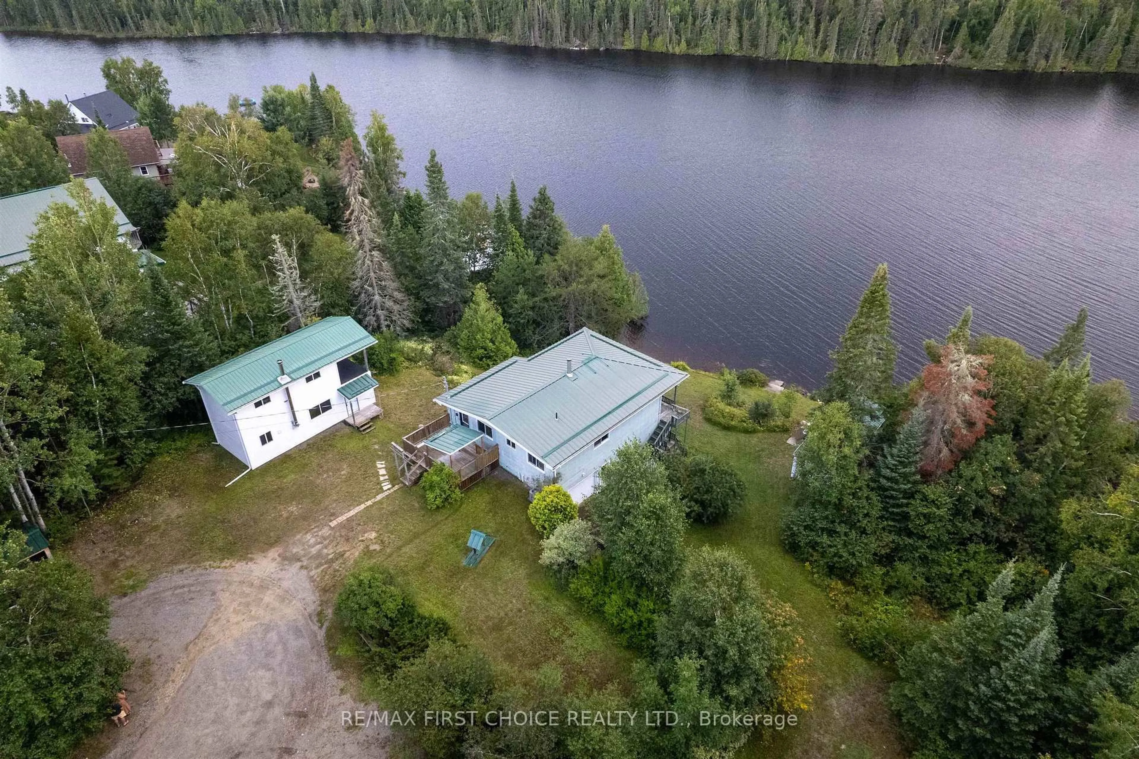 A pic from outside/outdoor area/front of a property/back of a property/a pic from drone, water/lake/river/ocean view for 32I One Island Lake Rd, Thunder Bay Remote Area Ontario P7G 0W4