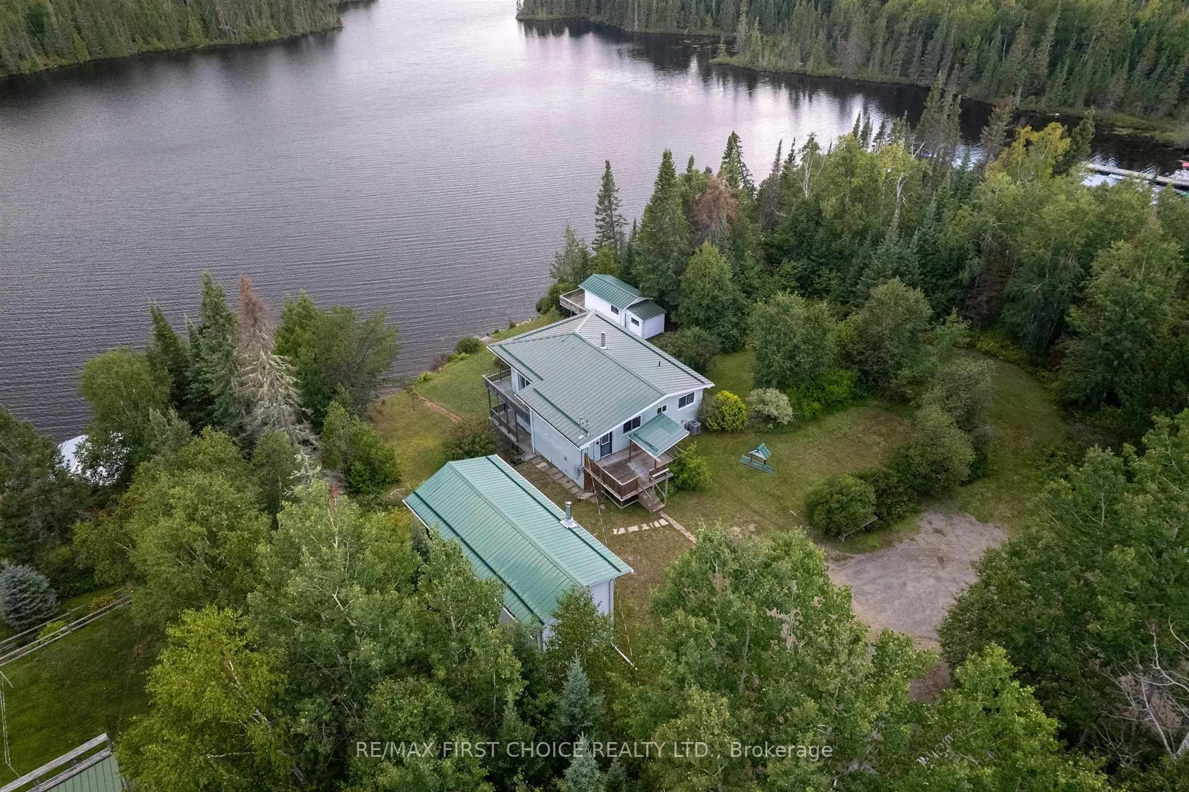 A pic from outside/outdoor area/front of a property/back of a property/a pic from drone, water/lake/river/ocean view for 32I One Island Lake Rd, Thunder Bay Remote Area Ontario P7G 0W4