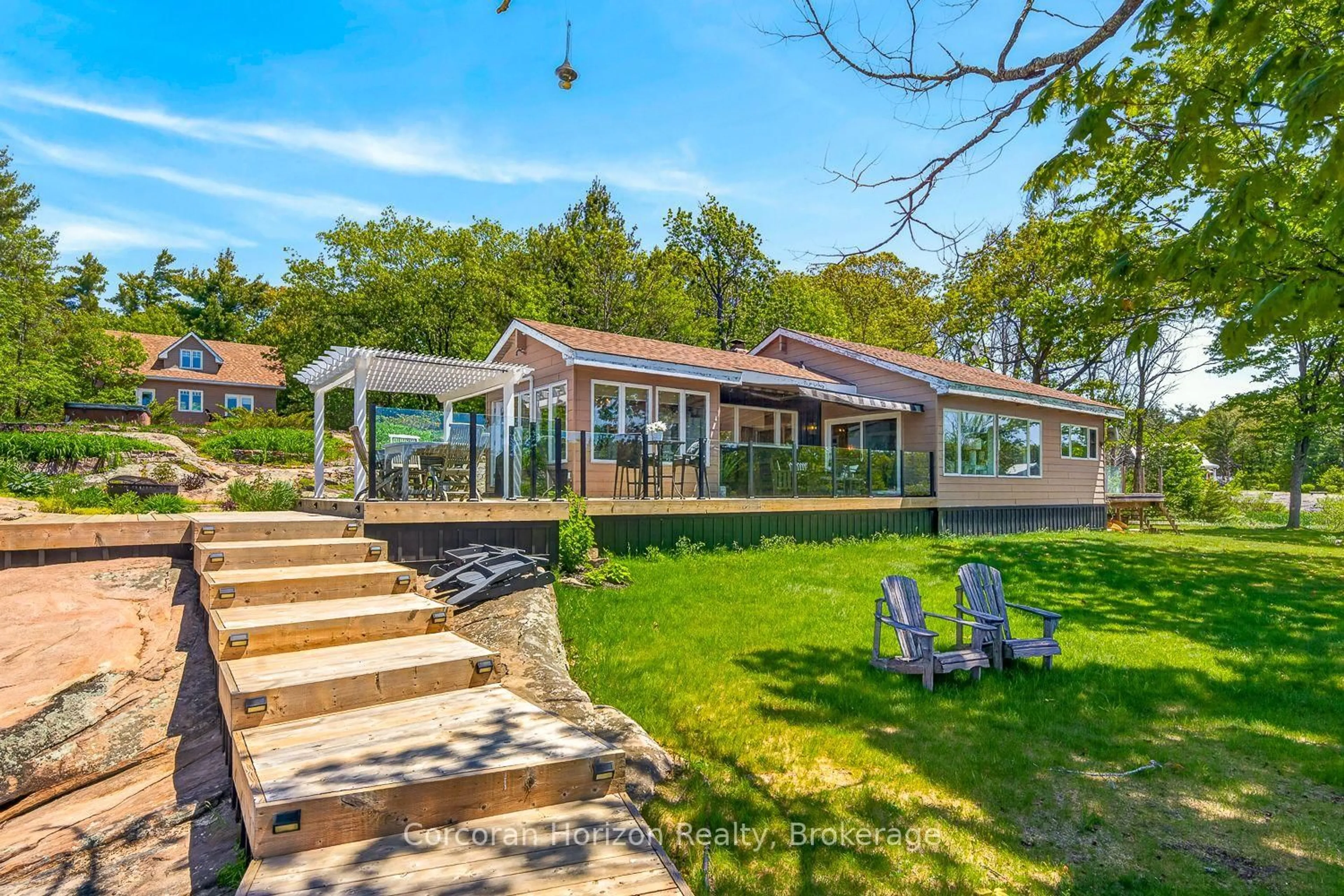 A pic from outside/outdoor area/front of a property/back of a property/a pic from drone, water/lake/river/ocean view for 4476 Island 1040/Little Beausoleil Island, Georgian Bay Ontario P0E 1E0