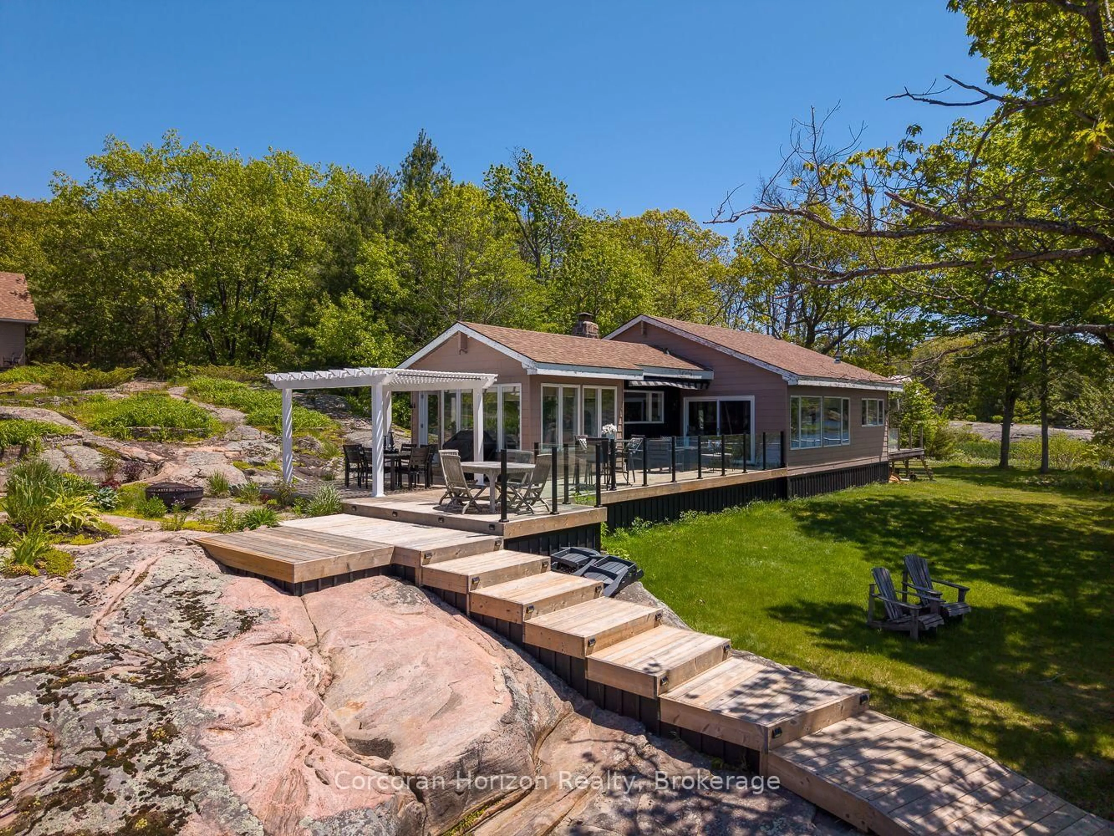 A pic from outside/outdoor area/front of a property/back of a property/a pic from drone, water/lake/river/ocean view for 4476 Island 1040/Little Beausoleil Island, Georgian Bay Ontario P0E 1E0