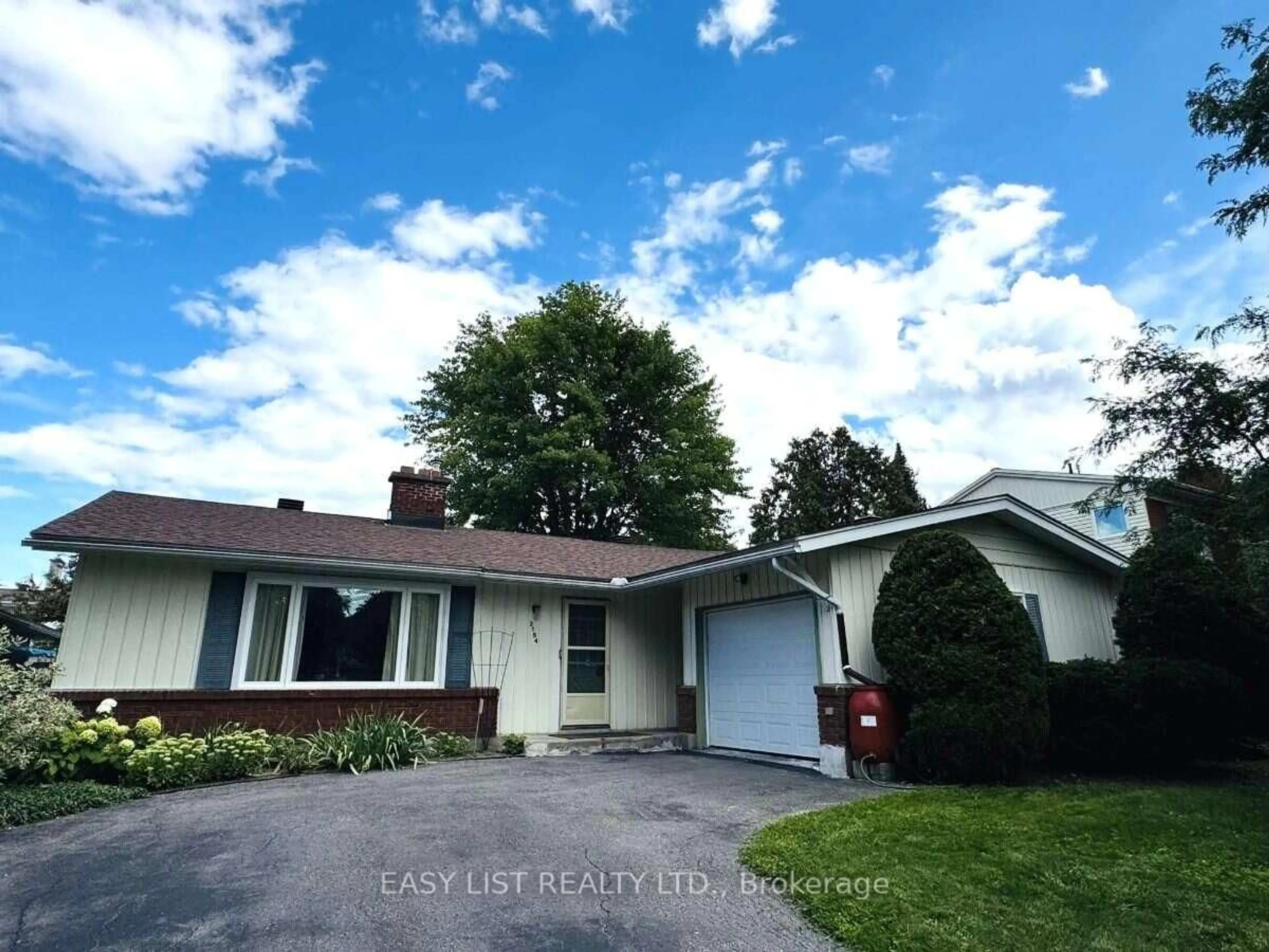 Home with vinyl exterior material, street for 2154 Dutton Cres, Ottawa Ontario K1J 6K4