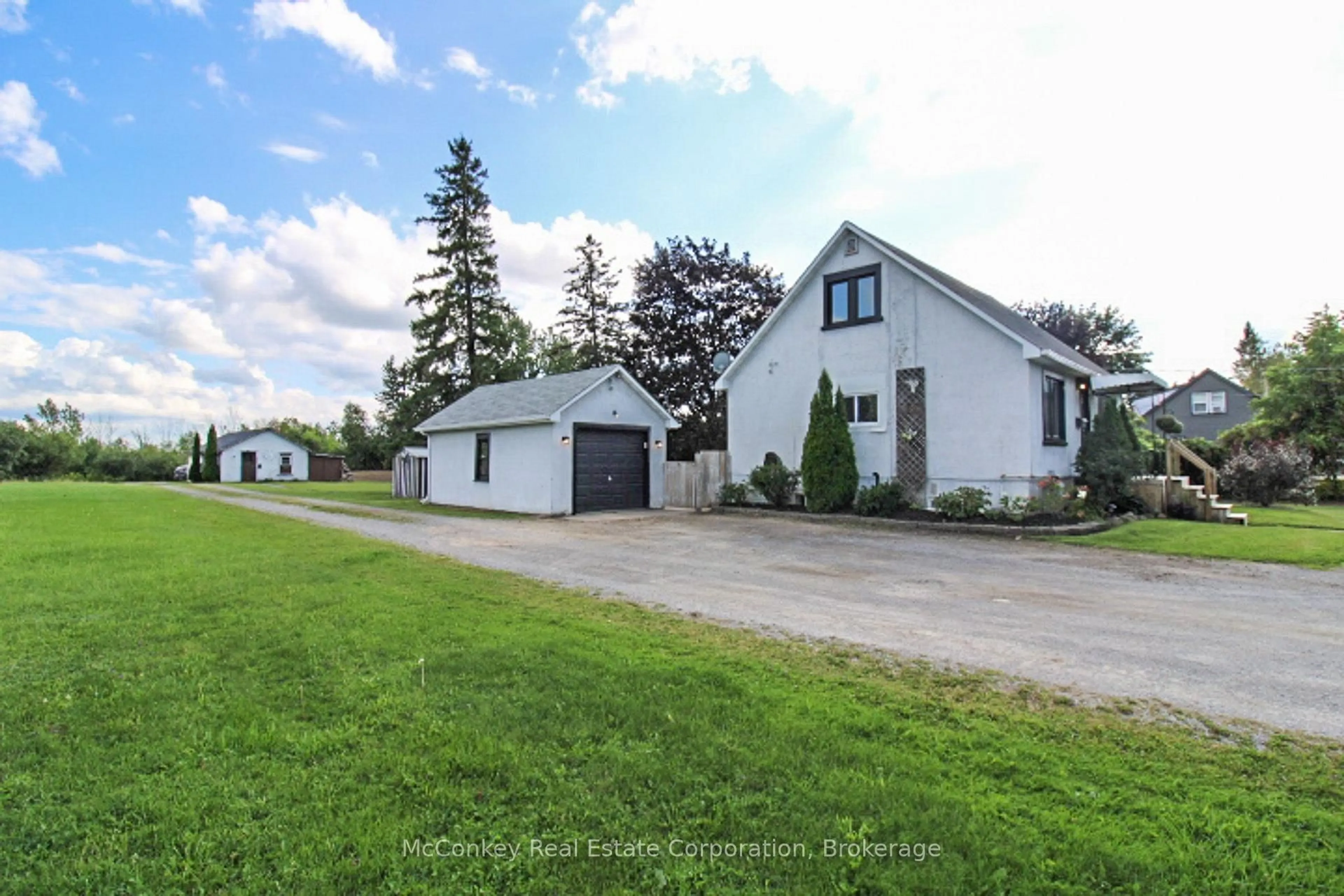 A pic from outside/outdoor area/front of a property/back of a property/a pic from drone, street for 51 COUNTY ROAD 4, Otonabee-South Monaghan Ontario K9L 1B8