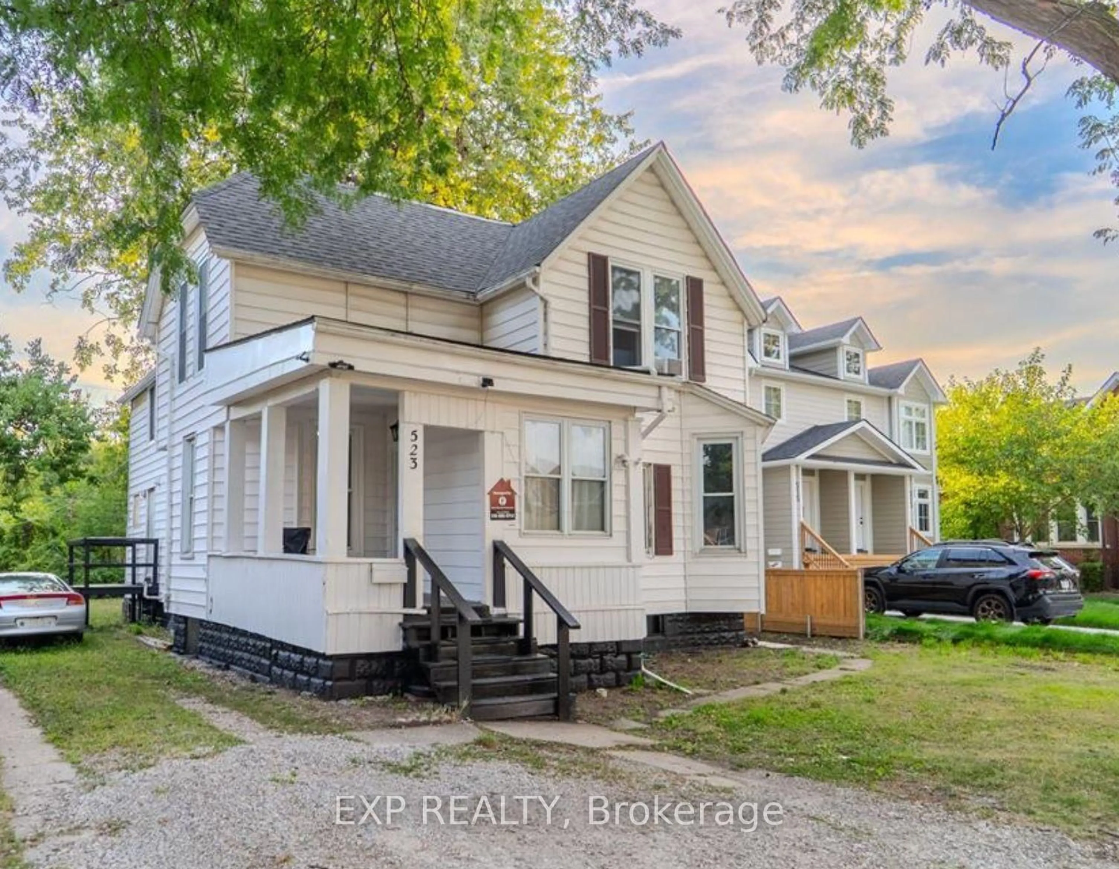 A pic from outside/outdoor area/front of a property/back of a property/a pic from drone, street for 523 Caron Ave, Windsor Ontario N9A 5B5
