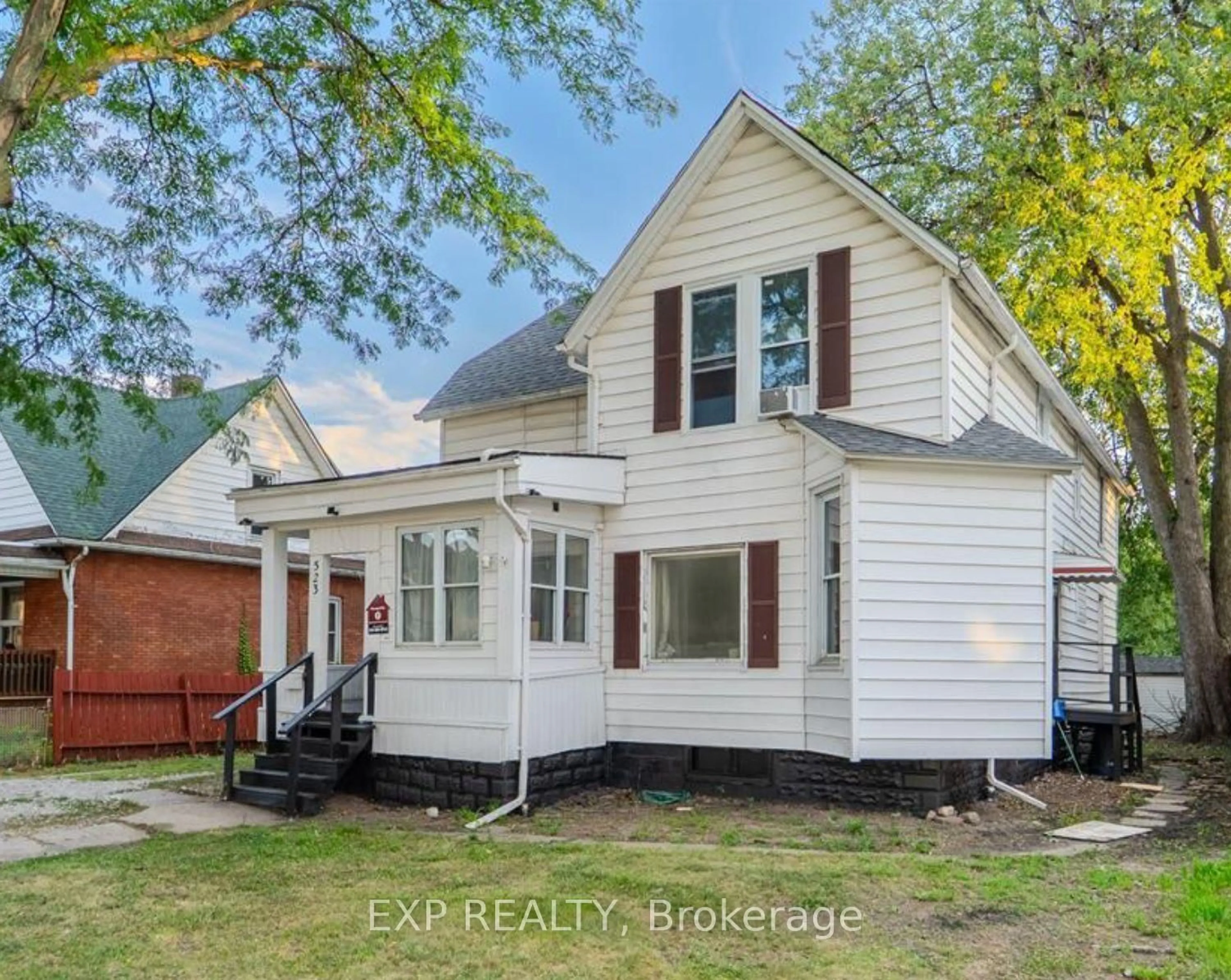 Home with vinyl exterior material, street for 523 Caron Ave, Windsor Ontario N9A 5B5