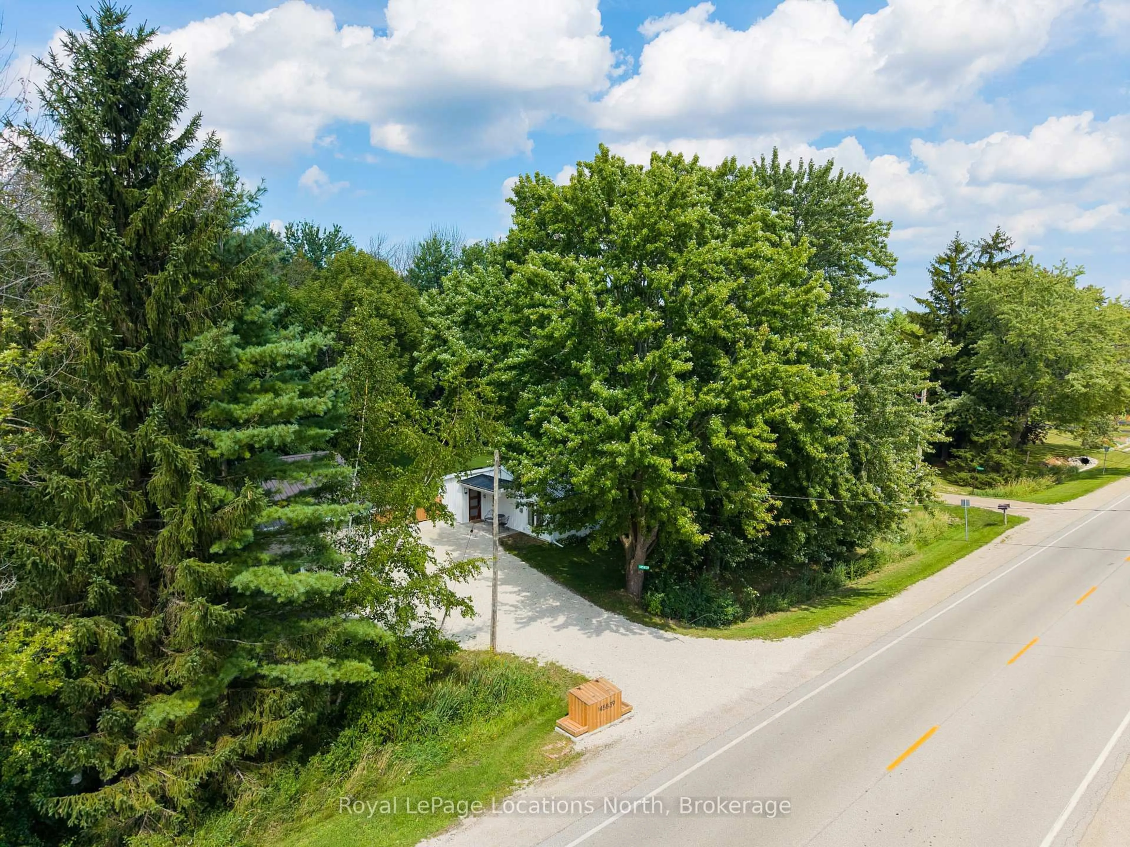 A pic from outside/outdoor area/front of a property/back of a property/a pic from drone, forest/trees view for 145839 GREY ROAD 12, Meaford Ontario N4L 1W5