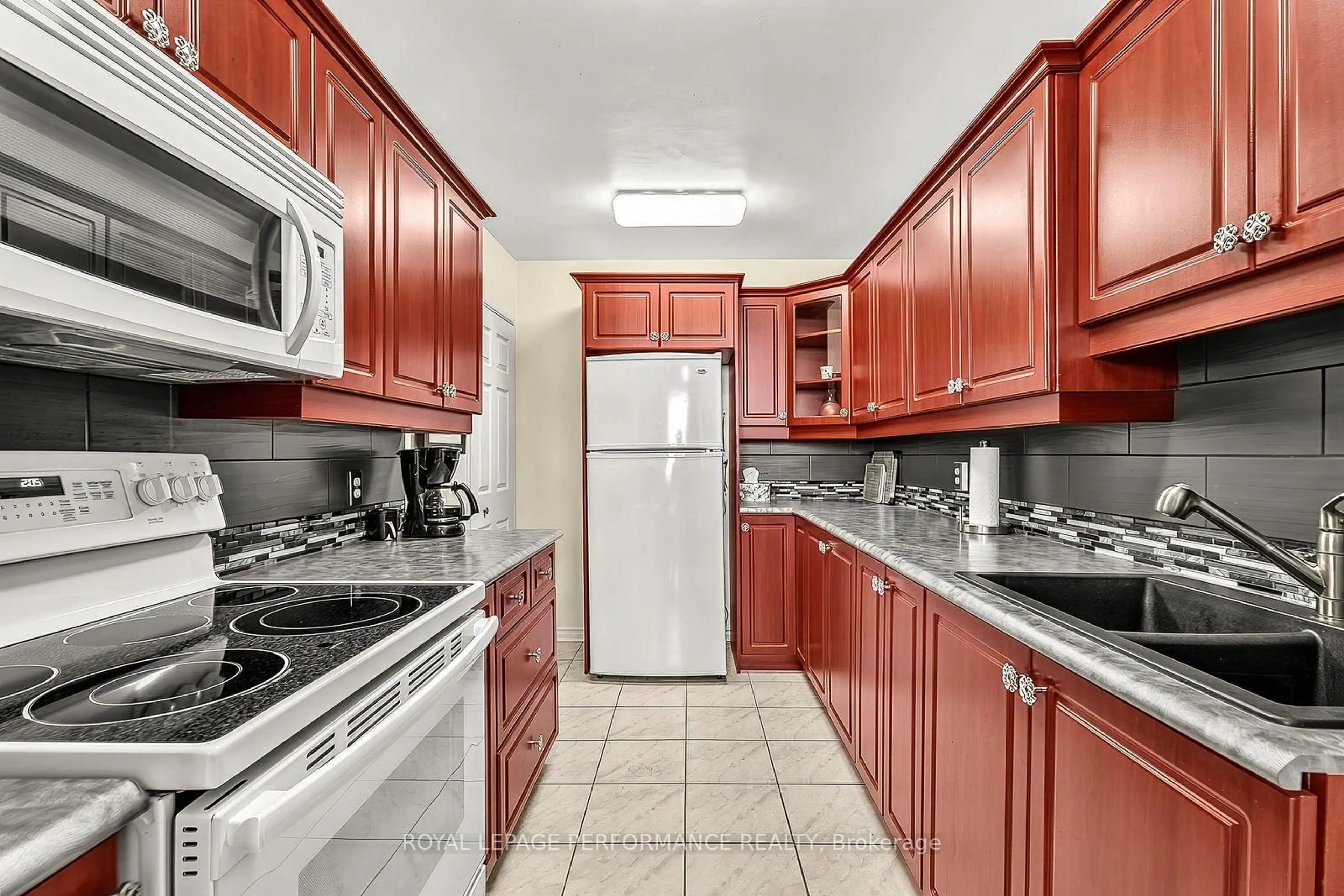 Standard kitchen, ceramic/tile floor for 2000 Jasmine Cres #1406, Ottawa Ontario K1J 8K4