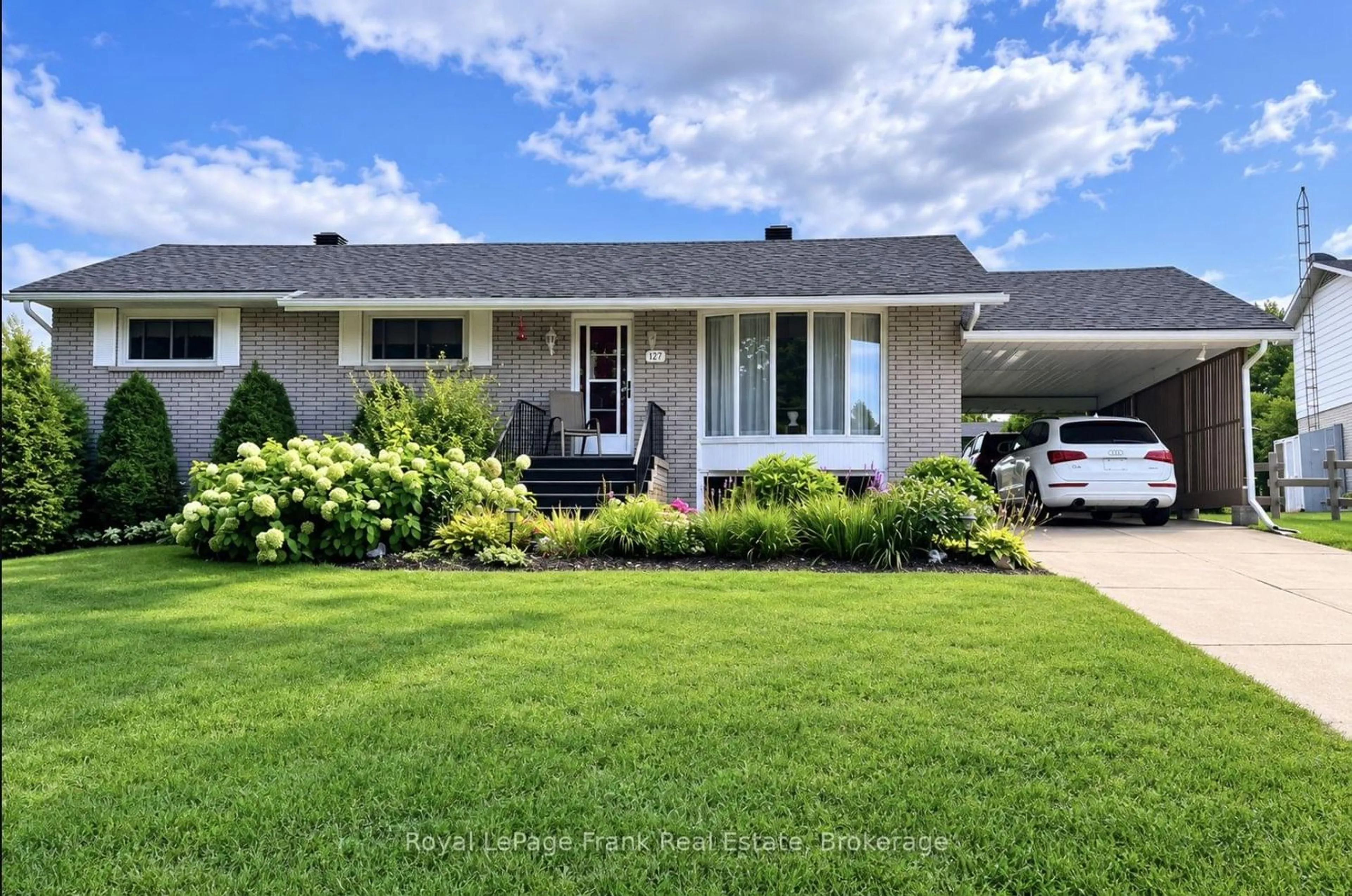 Home with vinyl exterior material, street for 127 Bridge St, Bancroft Ontario K0L 1C0