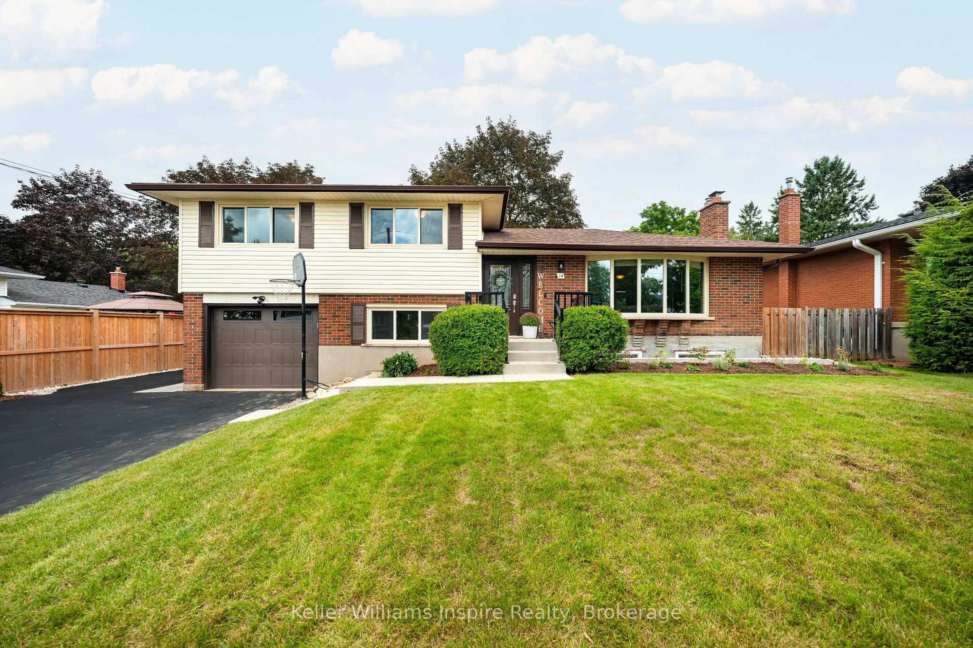 Home with brick exterior material, street for 14 CHELTONWOOD AVE., Guelph Ontario N1E 4E3