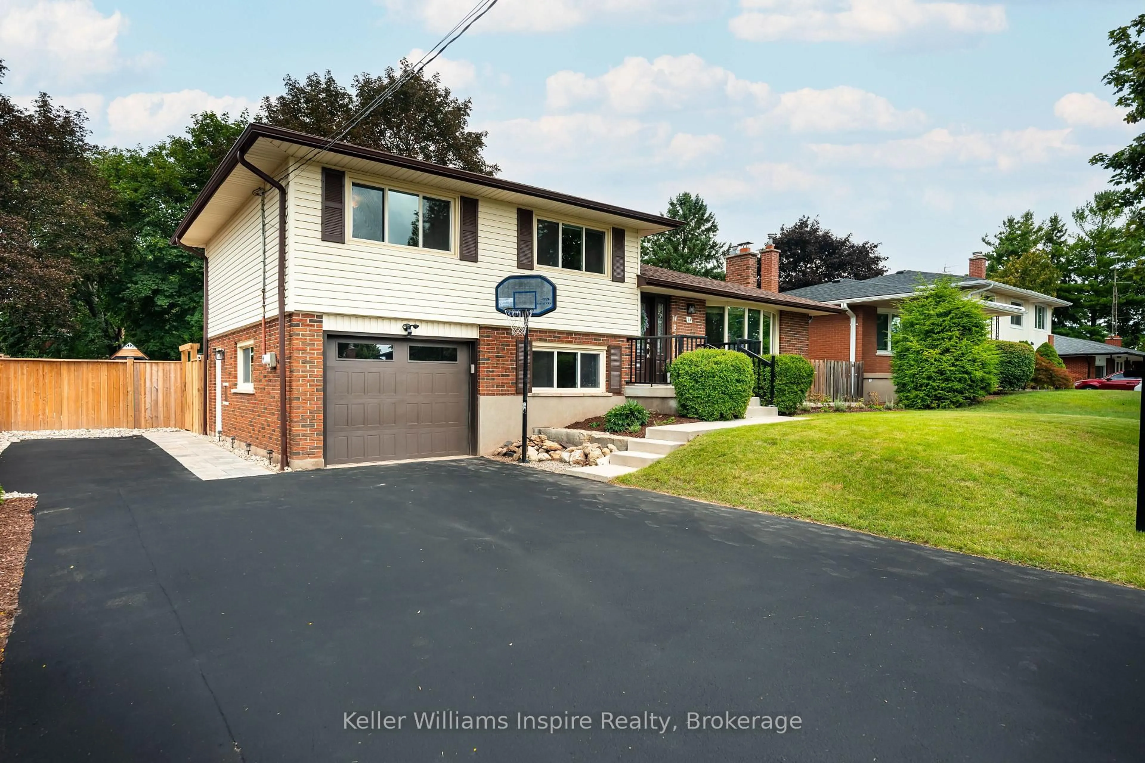 Home with brick exterior material, street for 14 CHELTONWOOD AVE., Guelph Ontario N1E 4E3