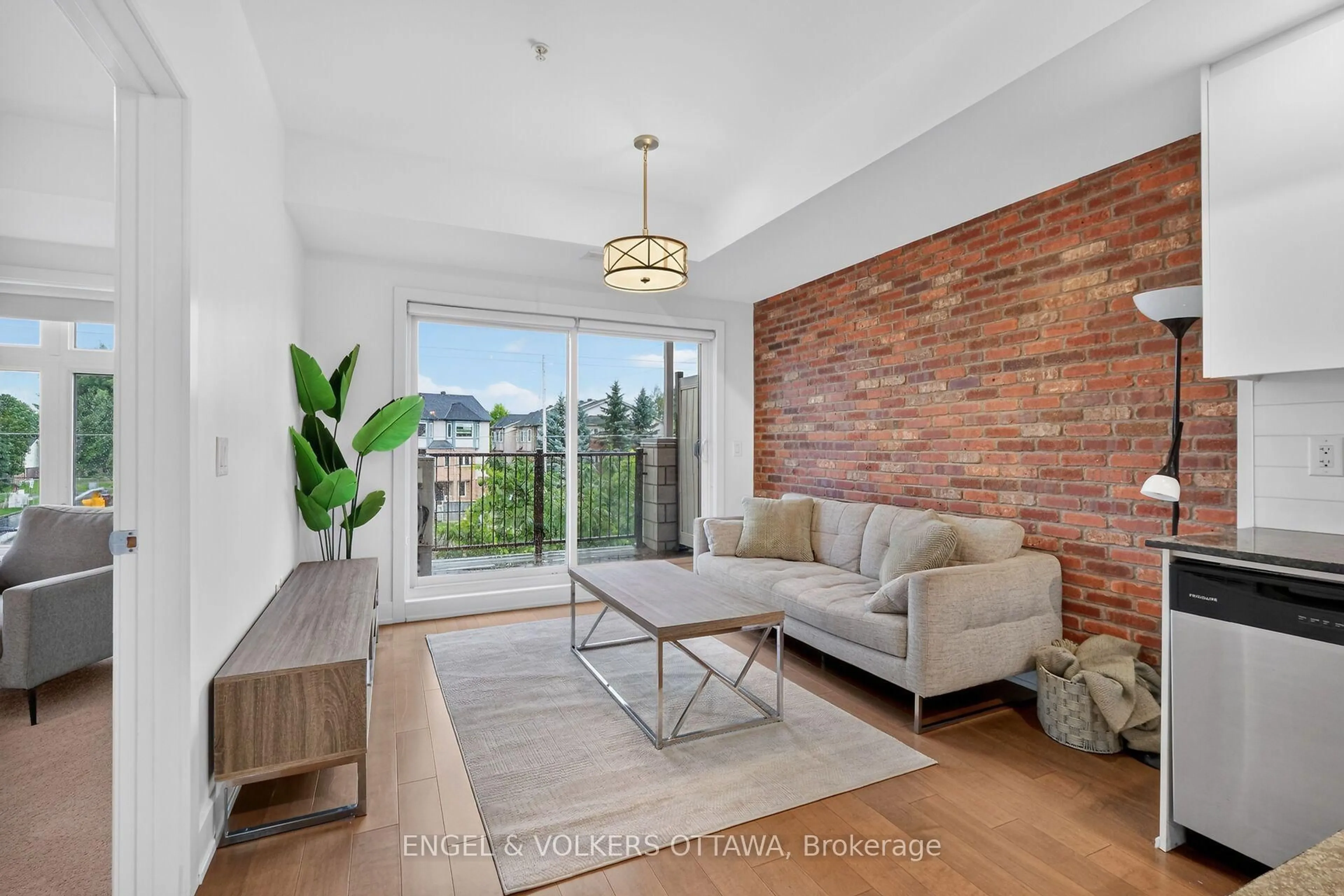 Living room with furniture, unknown for 2785 Baseline Rd #310, Ottawa Ontario K2H 1G9