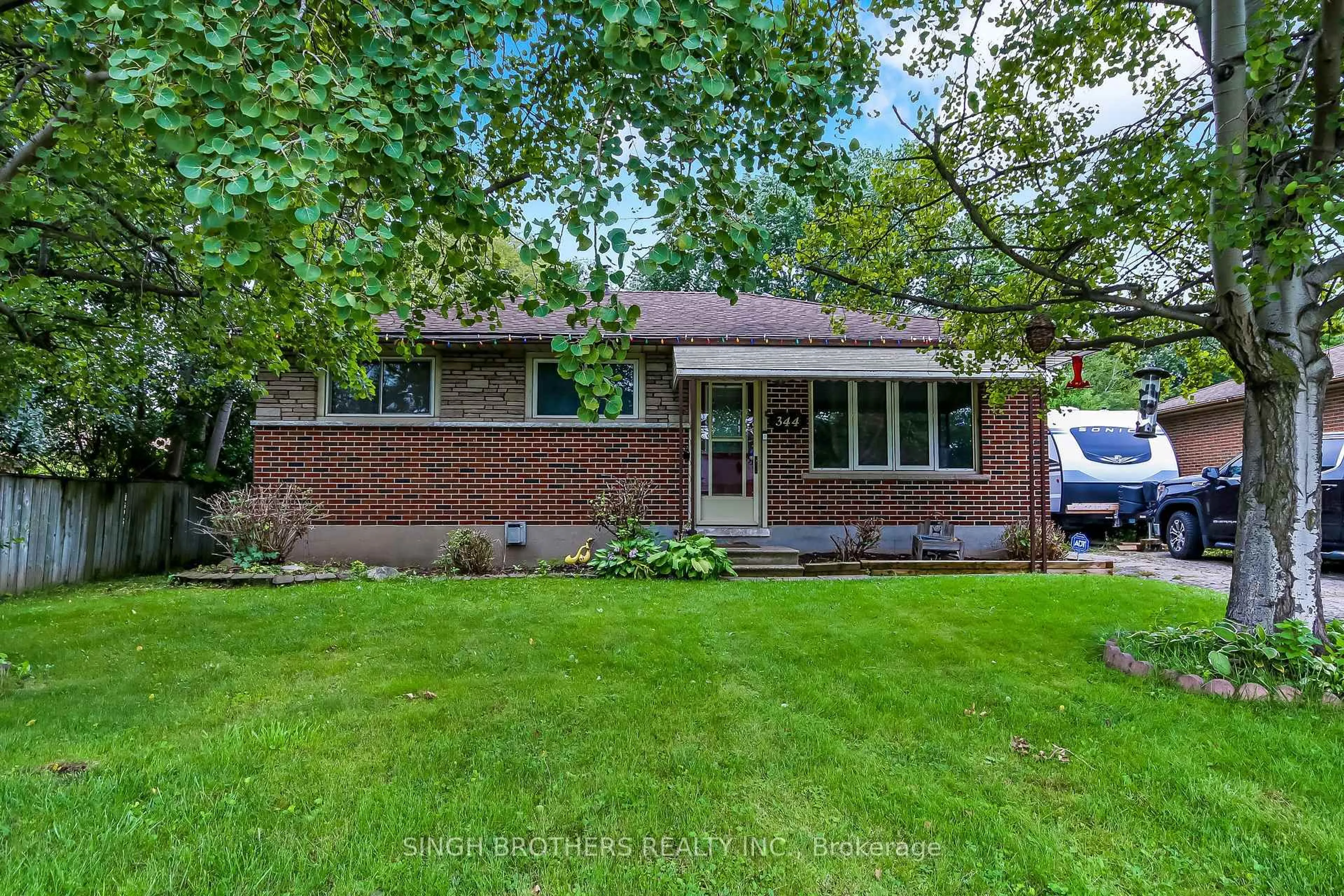 Home with brick exterior material, street for 344 Springbank Ave, Woodstock Ontario N4S 7R6