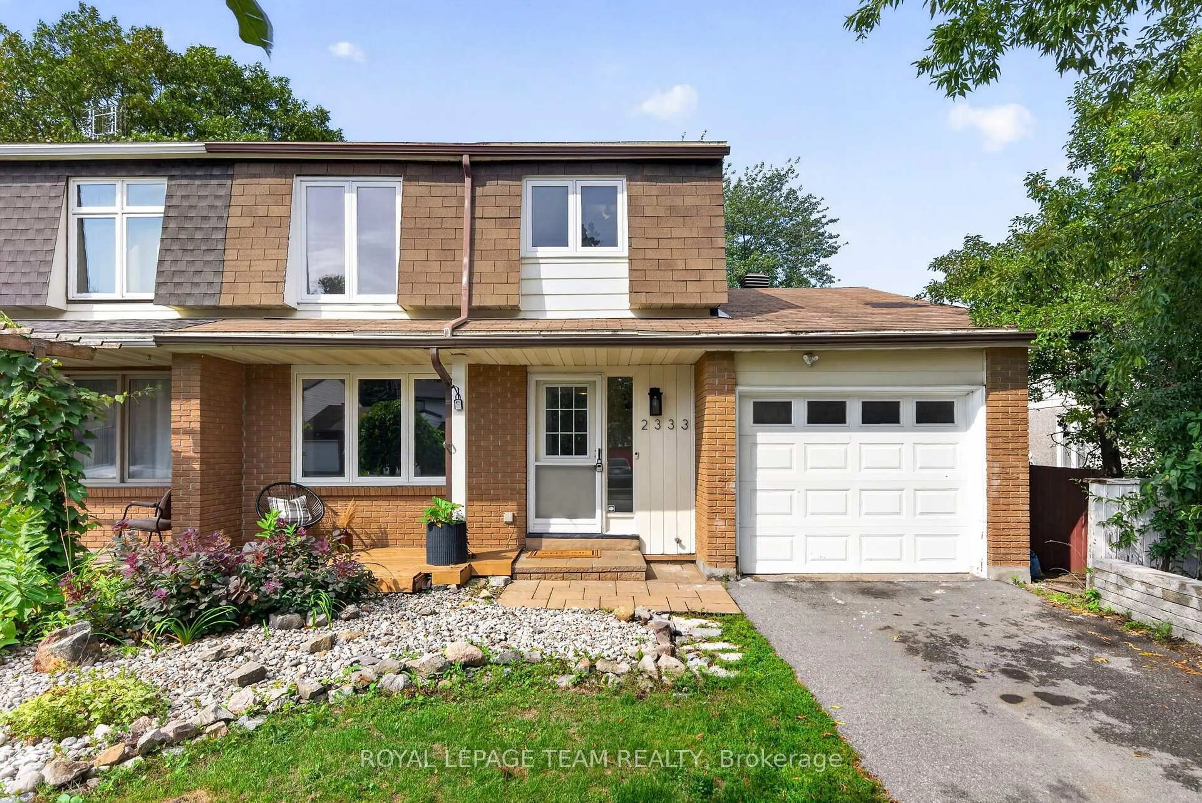 Home with brick exterior material, street for 2333 Cotters Cres, Ottawa Ontario K1V 8Y7