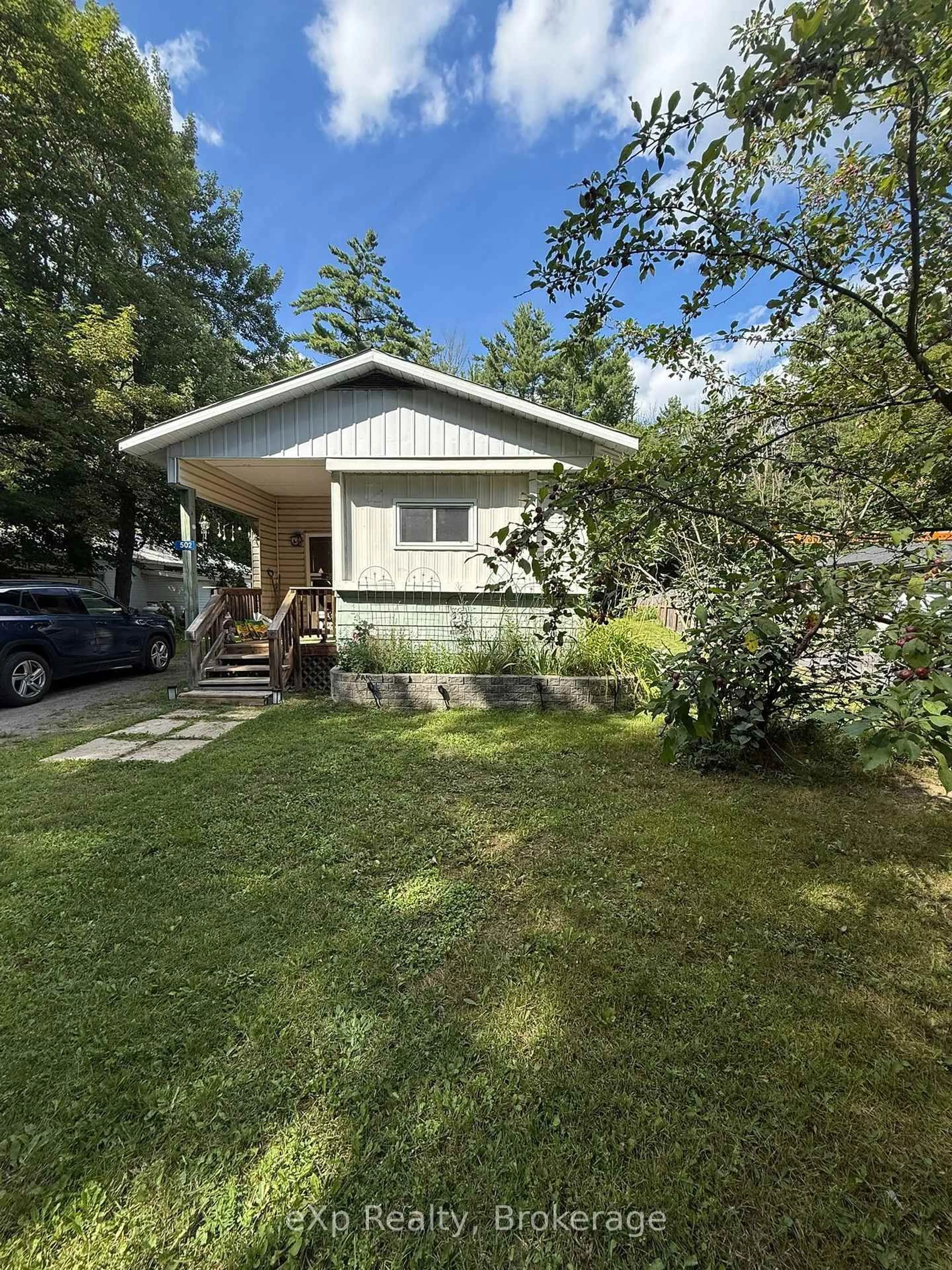 Home with vinyl exterior material, street for 1713 Highway 11 South Highway #502, Gravenhurst Ontario P0E 1G0