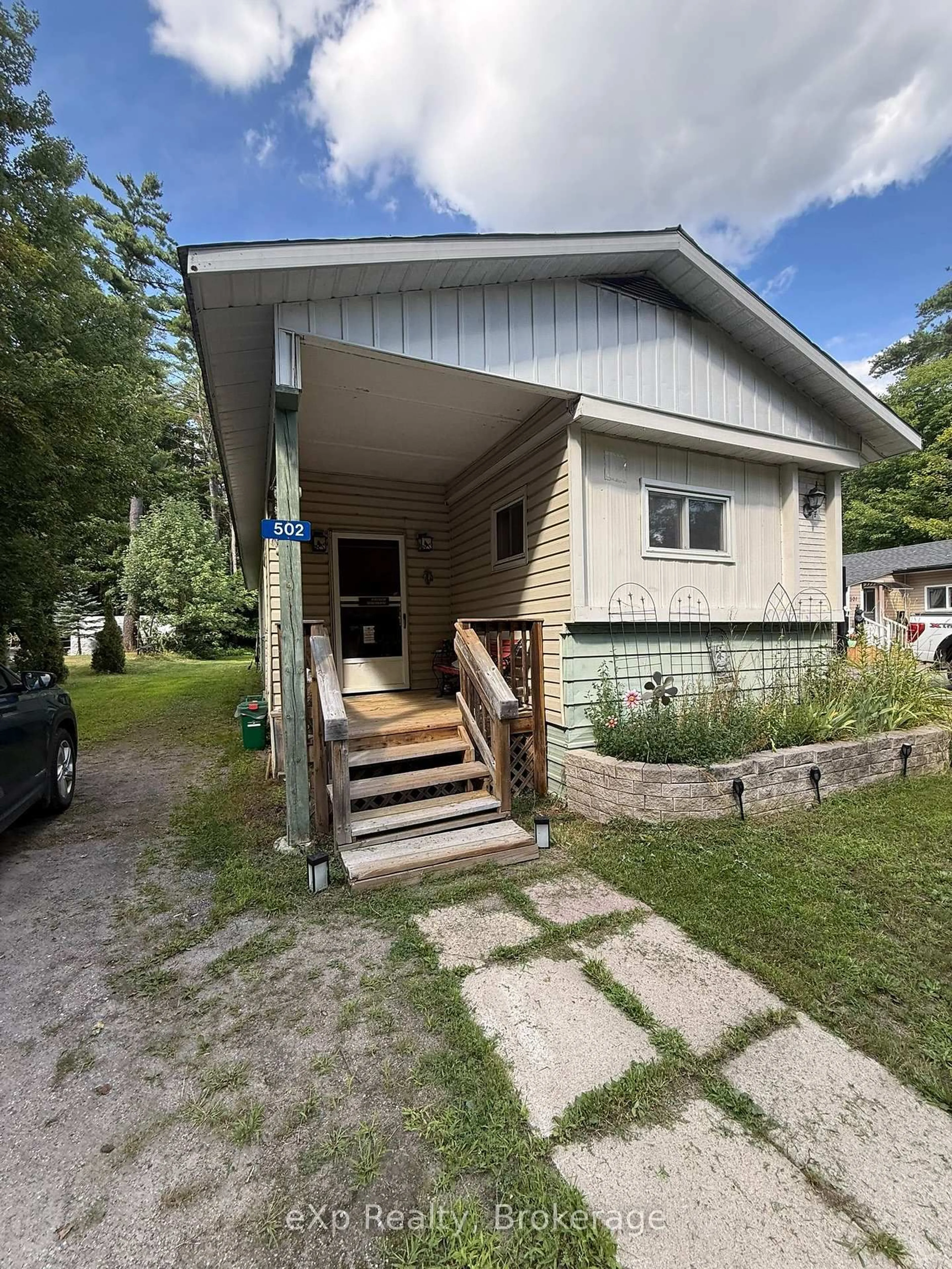 Home with vinyl exterior material, street for 1713 Highway 11 South Highway #502, Gravenhurst Ontario P0E 1G0