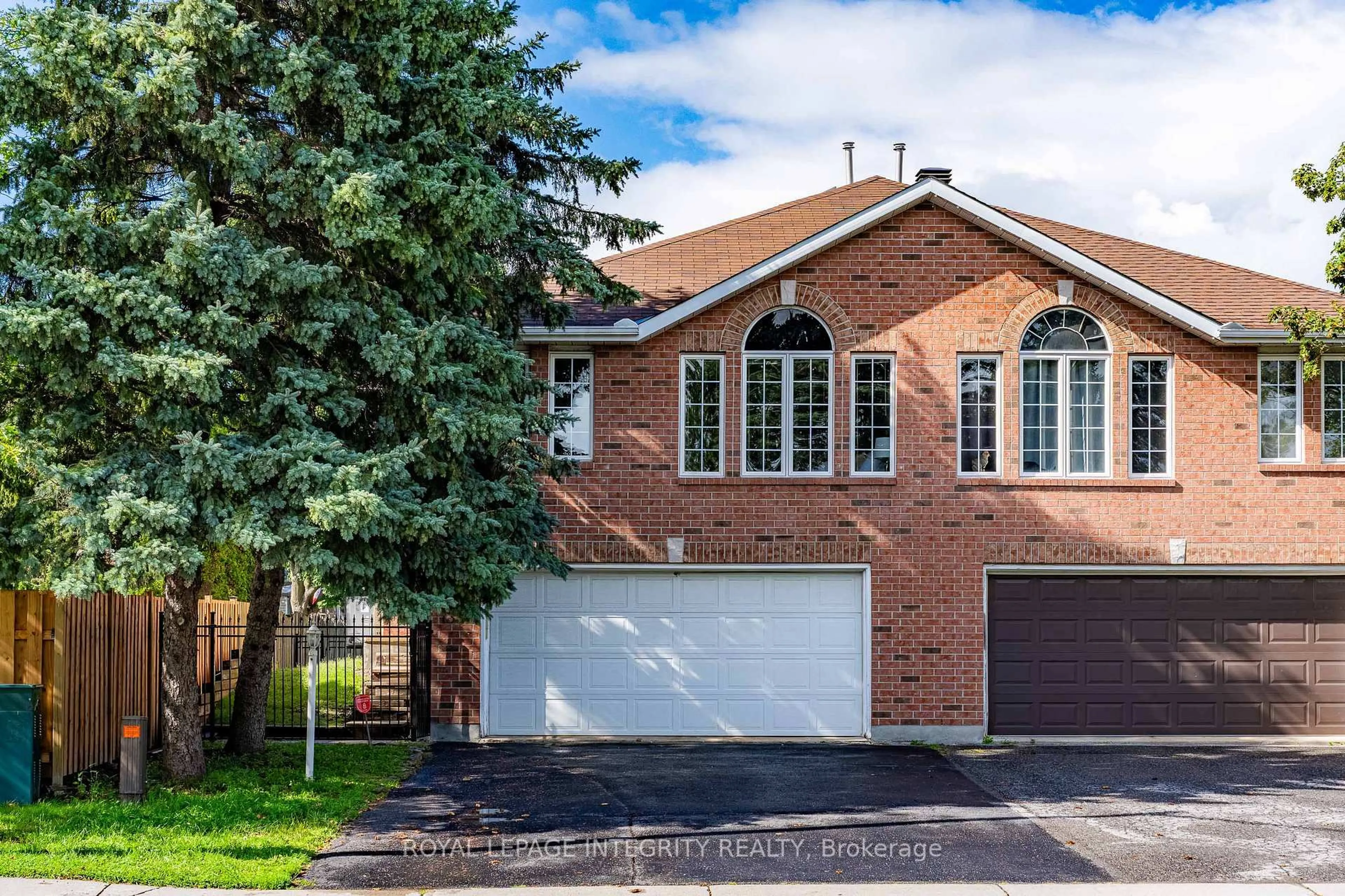 Home with brick exterior material, street for 133 Mountshannon Dr, Ottawa Ontario K2J 4M5