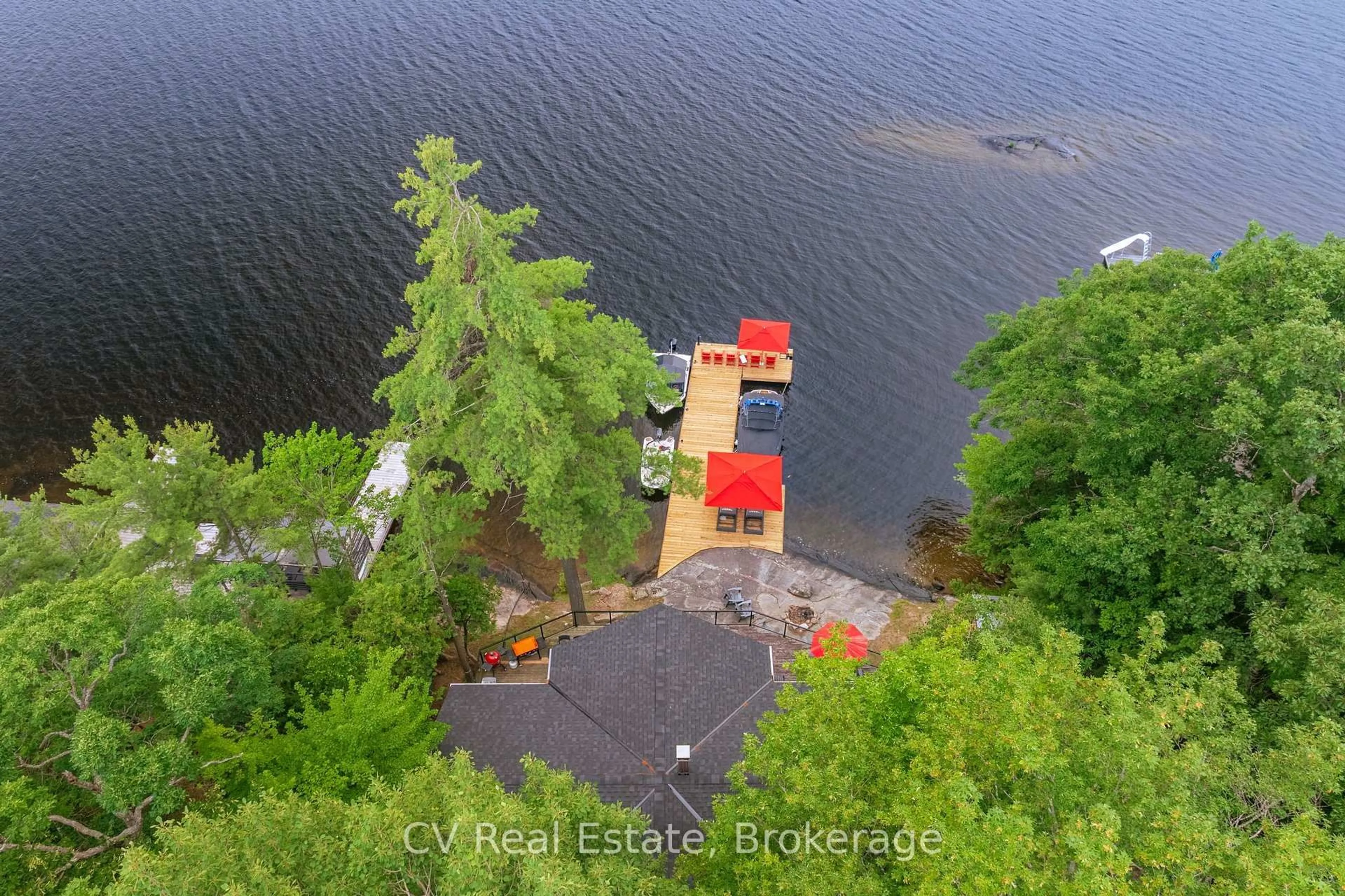 A pic from outside/outdoor area/front of a property/back of a property/a pic from drone, water/lake/river/ocean view for 776 Eileen Gowan Island, Bracebridge Ontario P1L 1X6