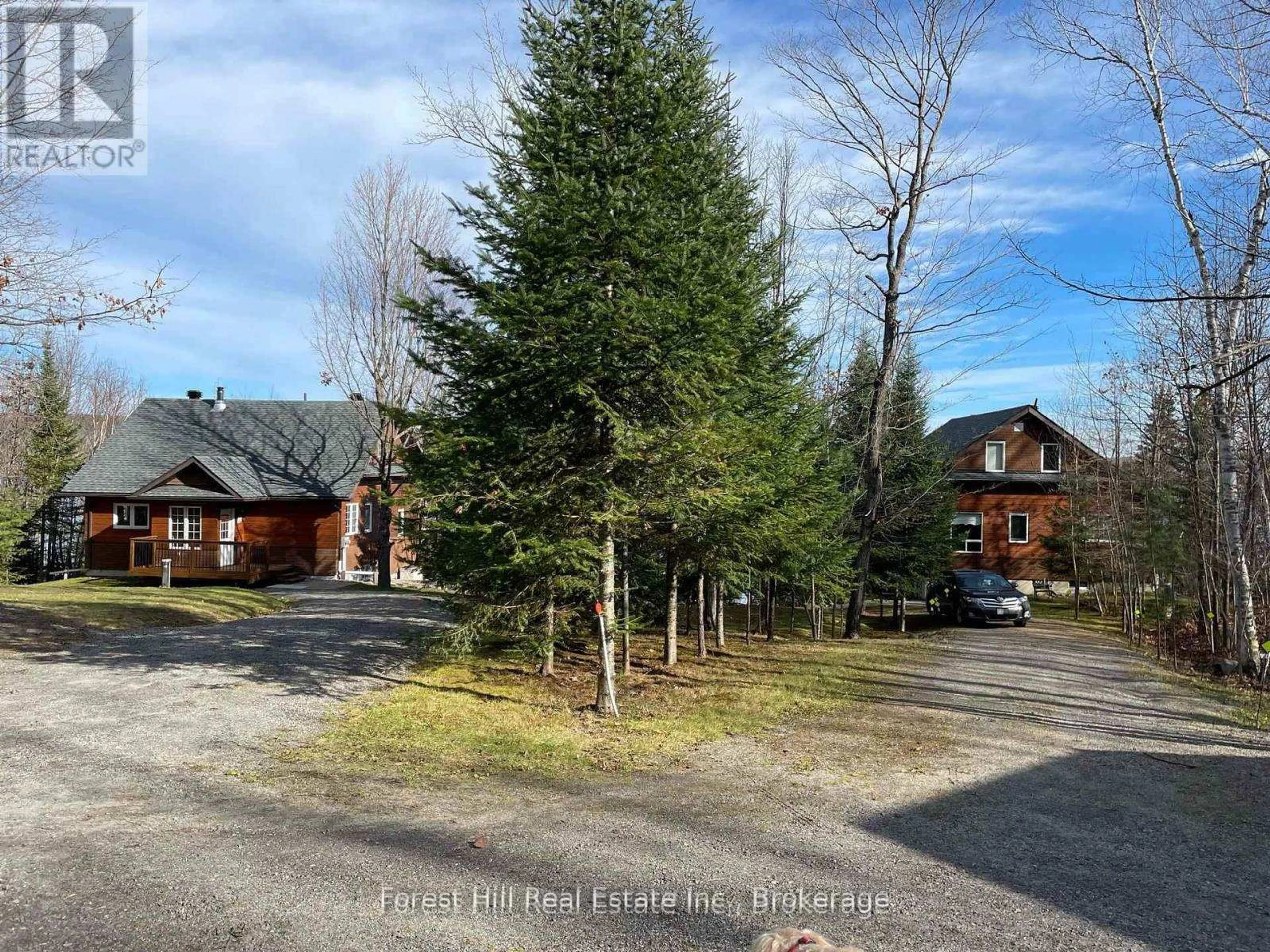 A pic from outside/outdoor area/front of a property/back of a property/a pic from drone, forest/trees view for 919 Limberlost Point Rd, Parry Sound Remote Area Ontario P0H 2R0