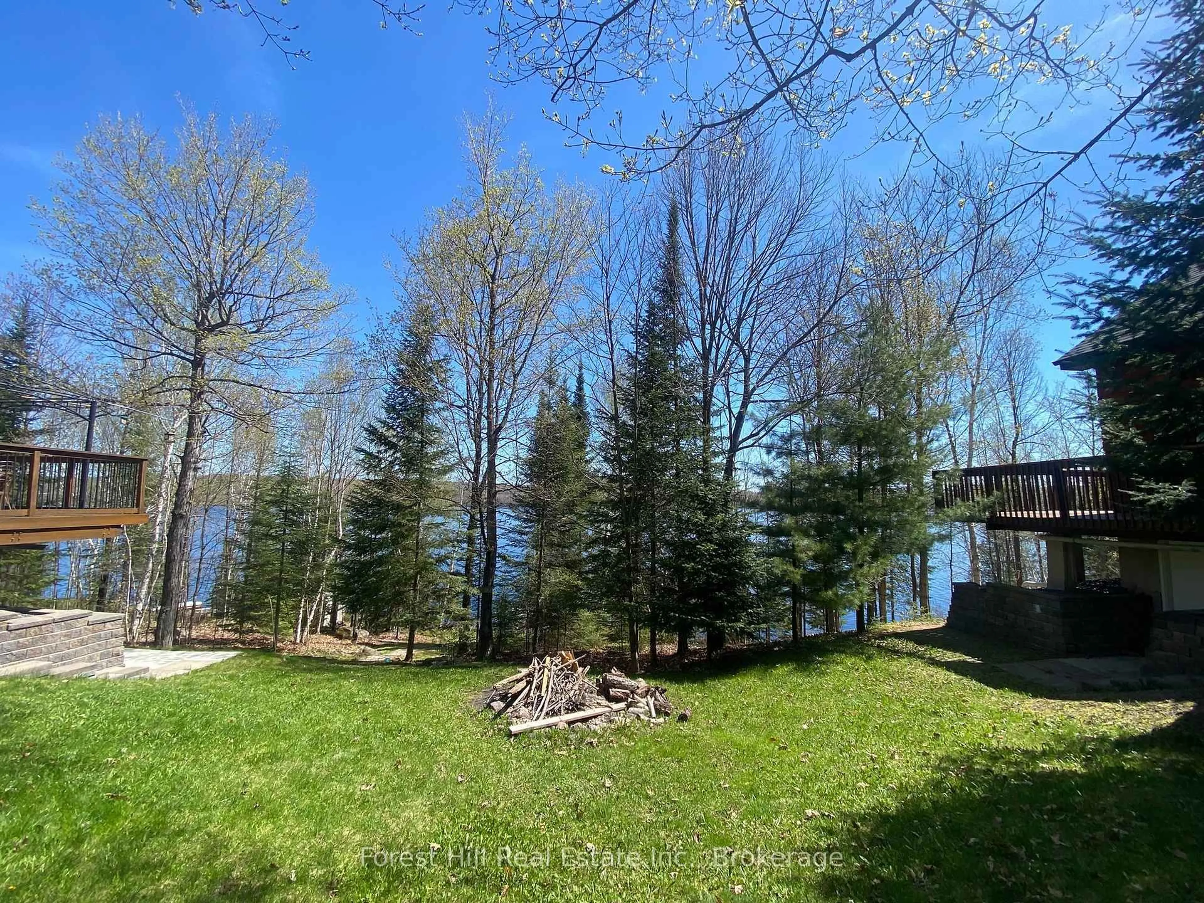 A pic from outside/outdoor area/front of a property/back of a property/a pic from drone, water/lake/river/ocean view for 919 Limberlost Point Rd, Parry Sound Remote Area Ontario P0H 2R0