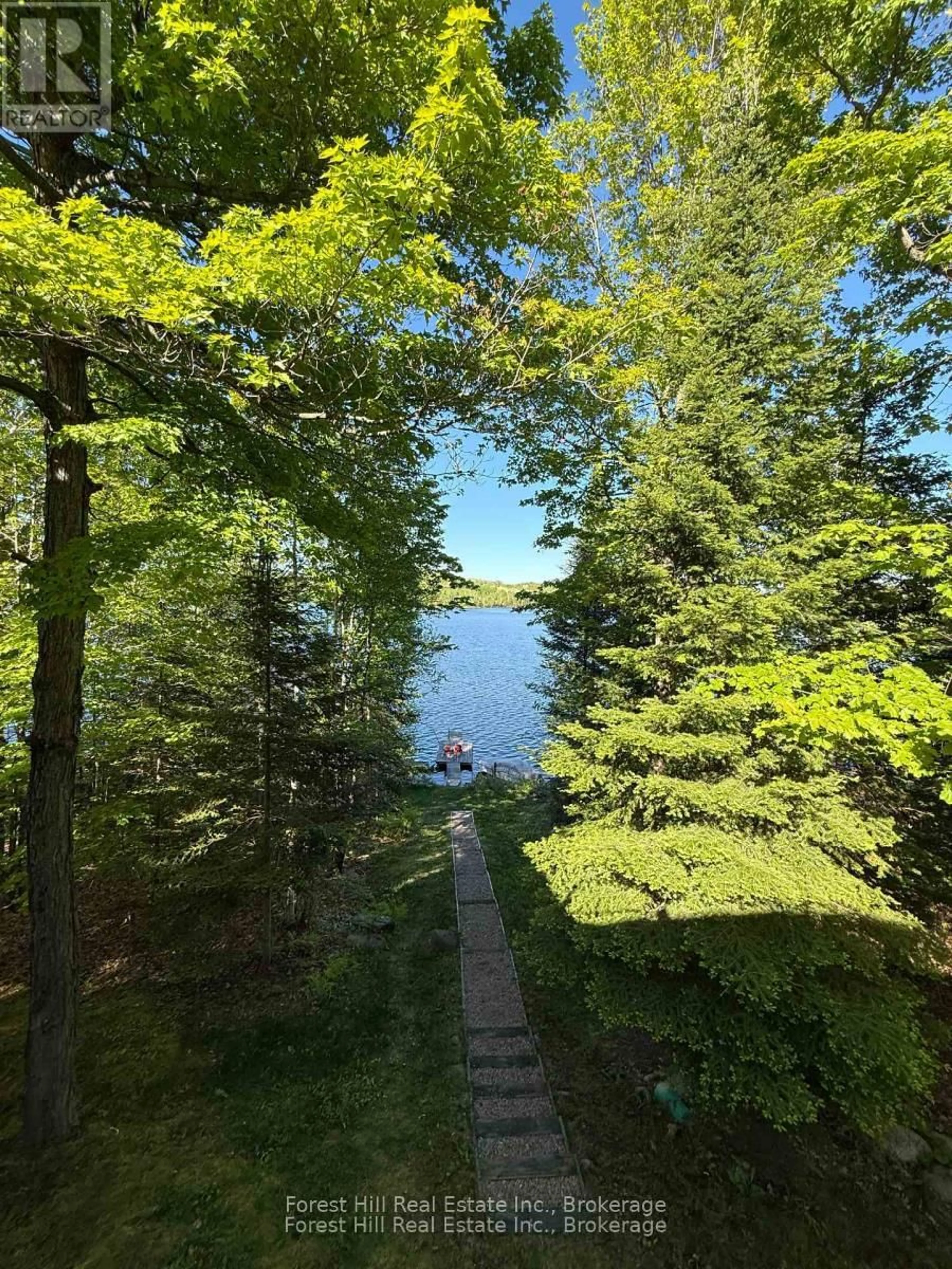 A pic from outside/outdoor area/front of a property/back of a property/a pic from drone, water/lake/river/ocean view for 919 Limberlost Point Rd, Parry Sound Remote Area Ontario P0H 2R0